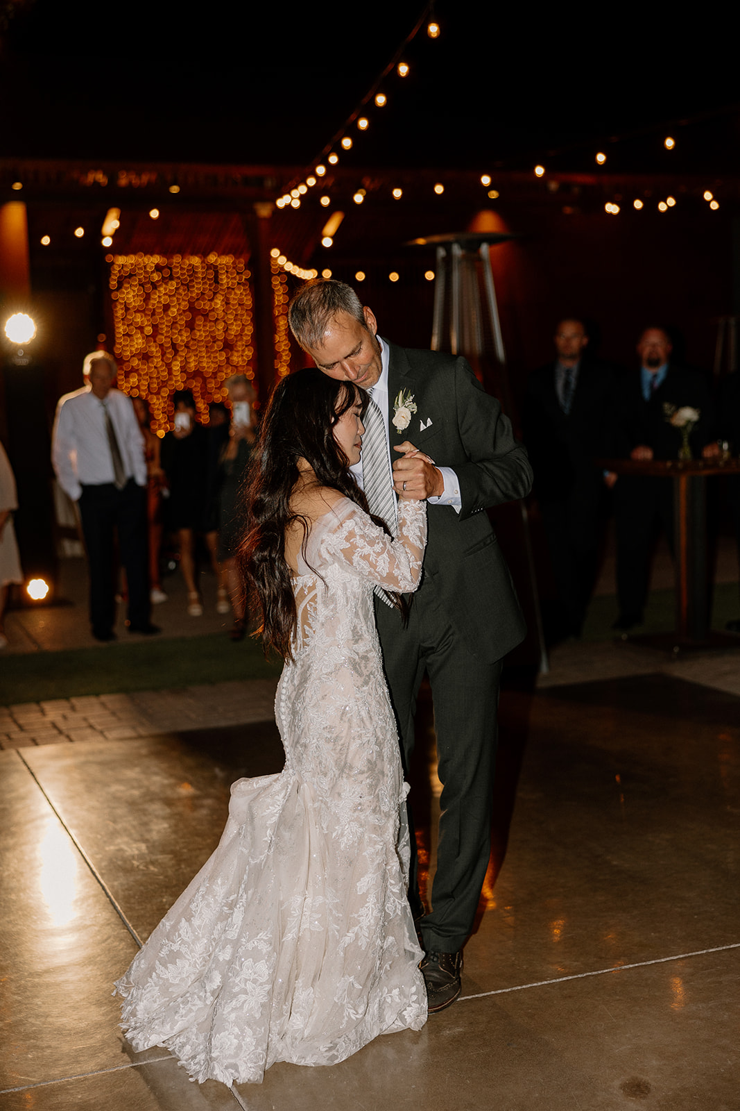 bride shares a dance with her father on her dreamy wedding day