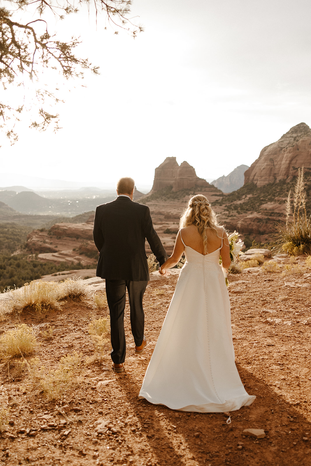stunning bride and groom pose together in one of the best desert locations to elope in Arizona!