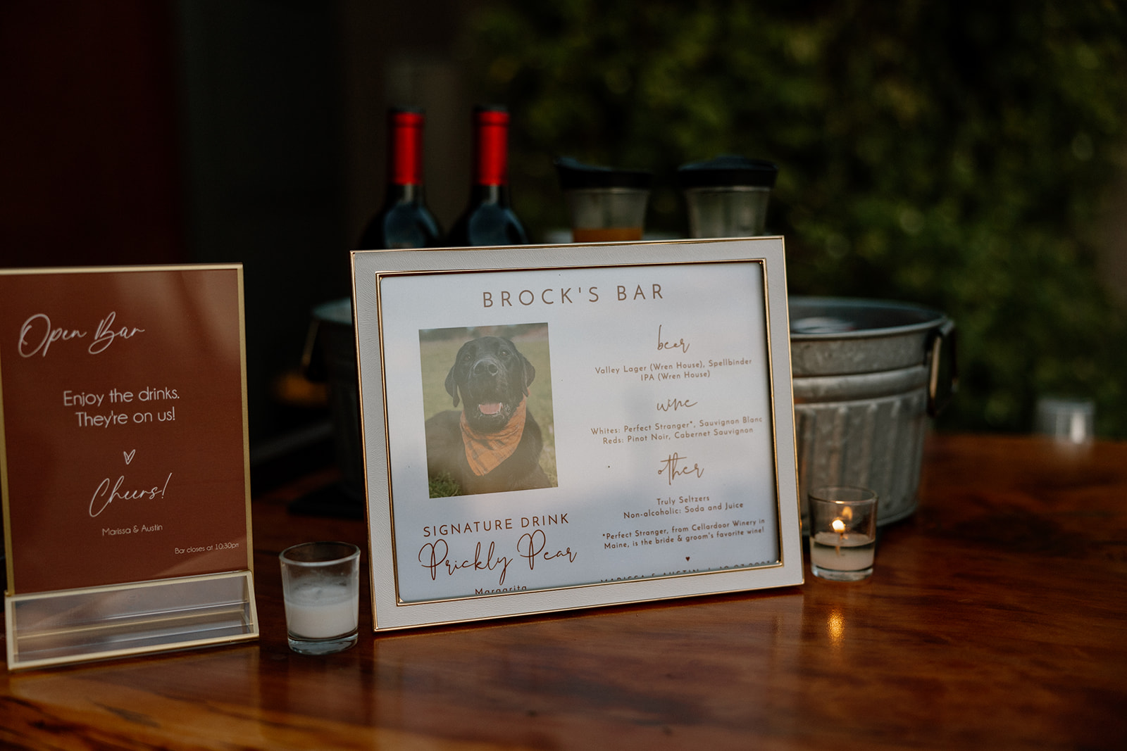 Detail photo of their bar arrangement featuring Brock the black lab! 