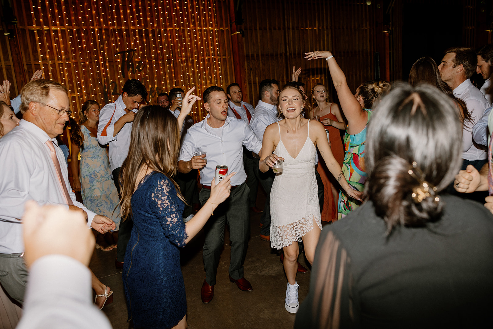 Bride and groom dance the night away with their guests