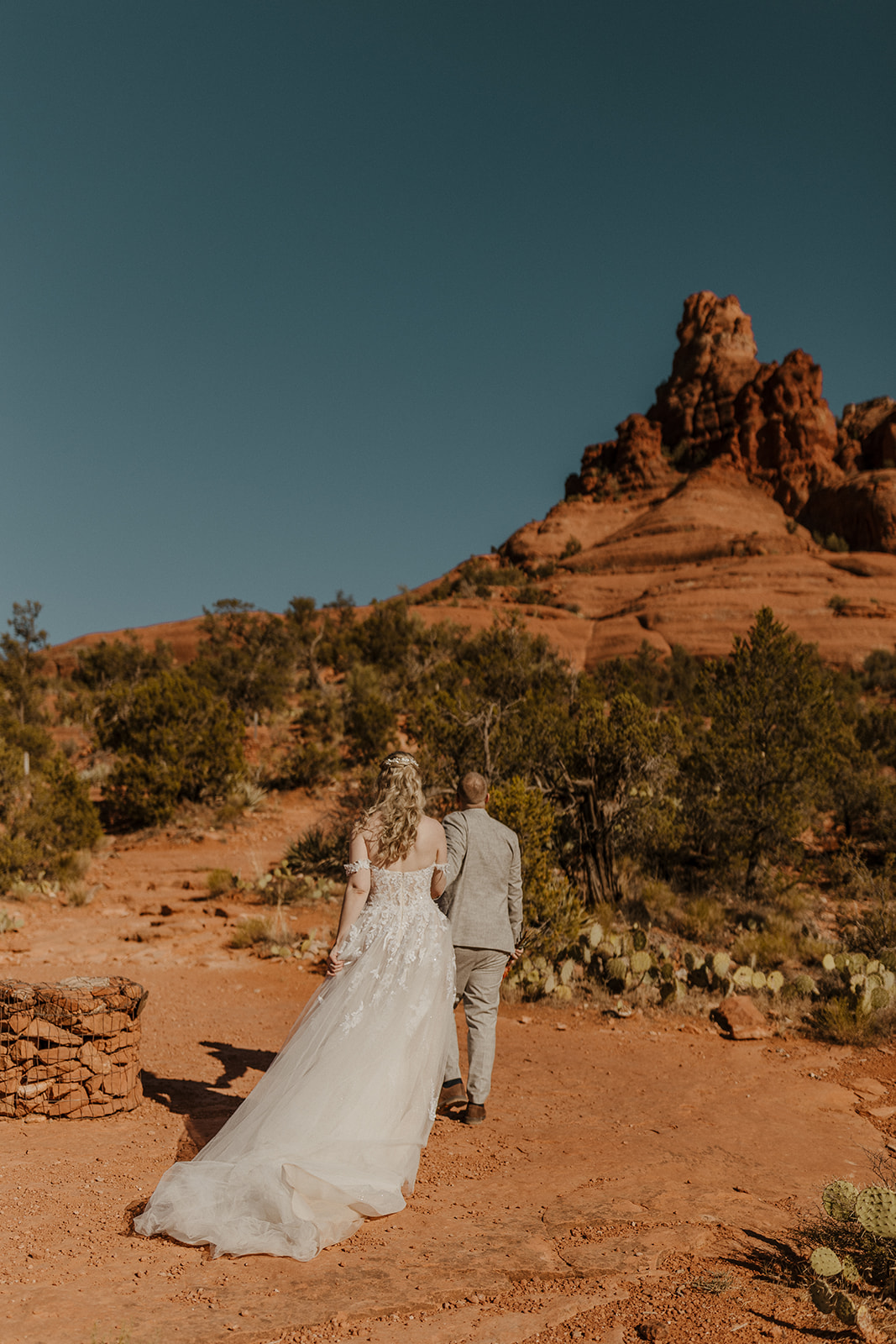 stunning bride and groom pose together in one of the best desert locations to elope in Arizona!