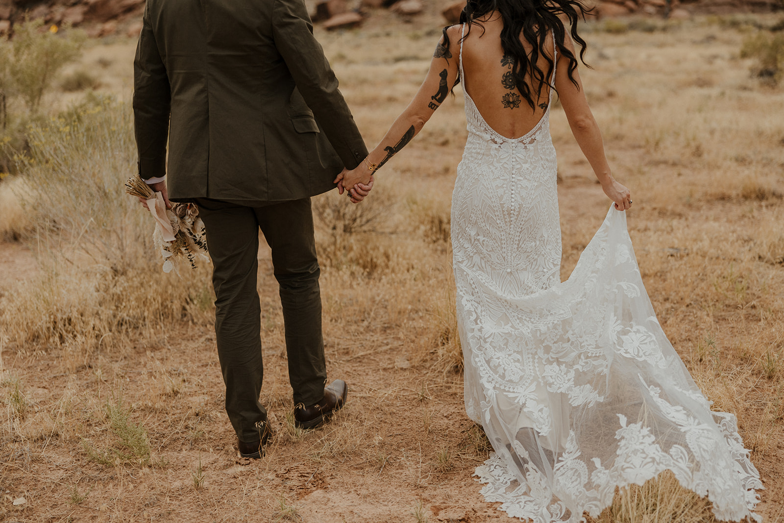 bride and groom pose together after their dreamy Arizona wedding