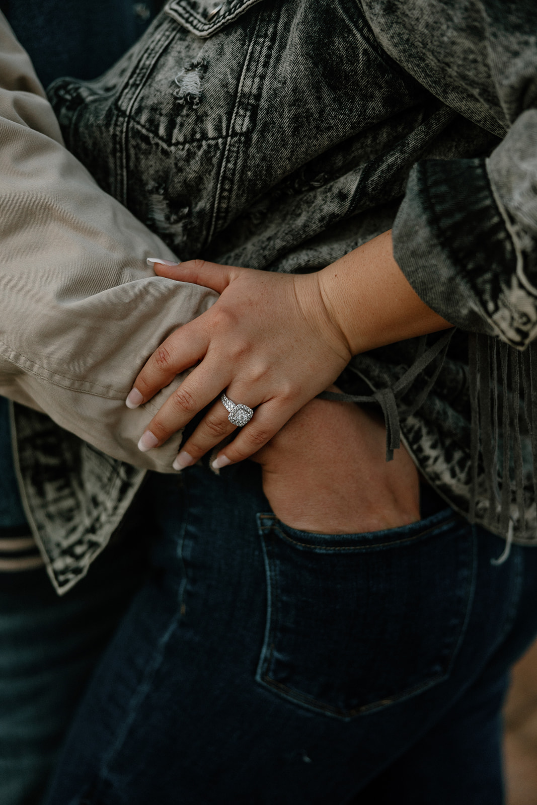 Up close and personal view of a beautiful Arizona couple and her new bling during their winter engagement photoshoot
