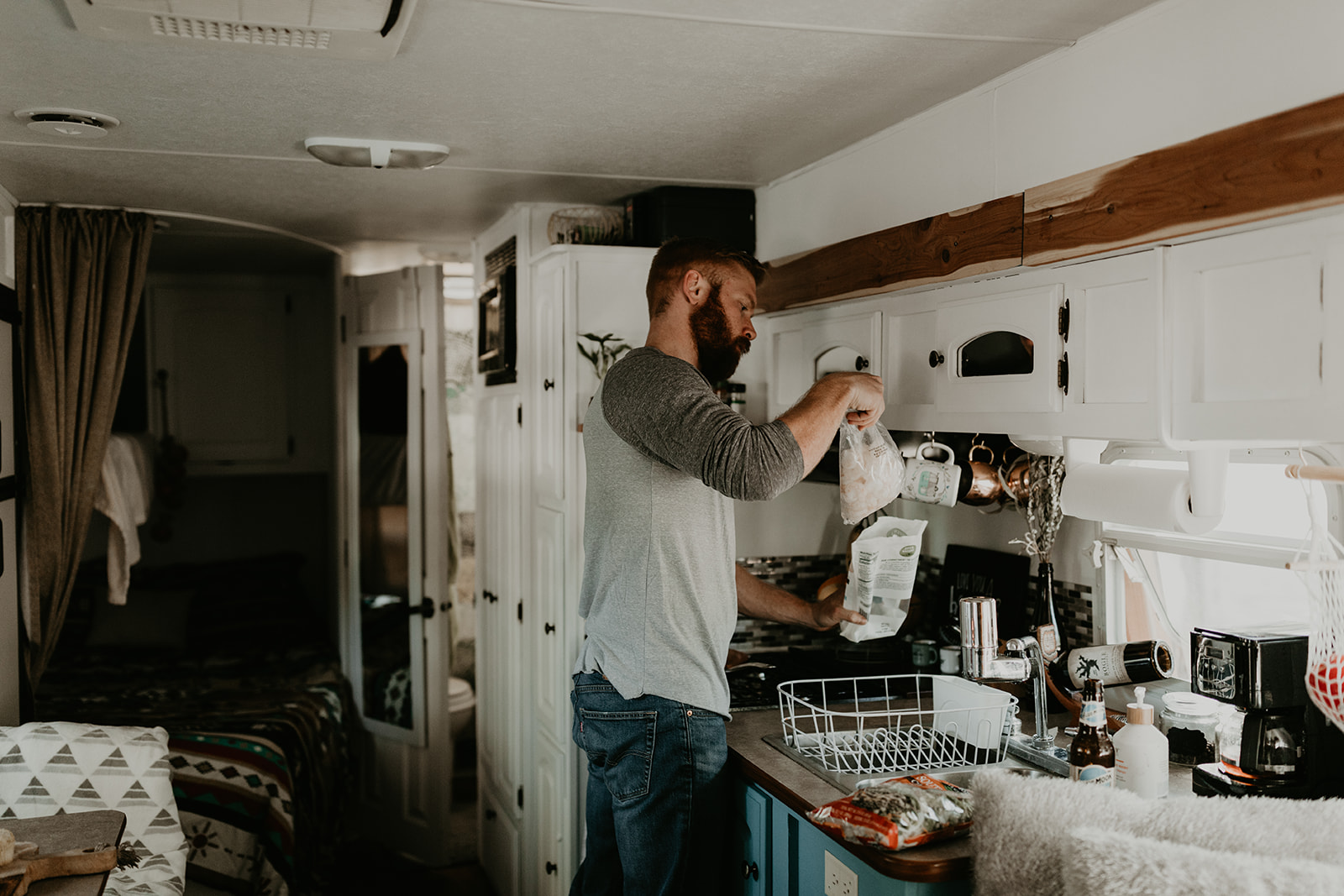 husband preps food in the kitchen 