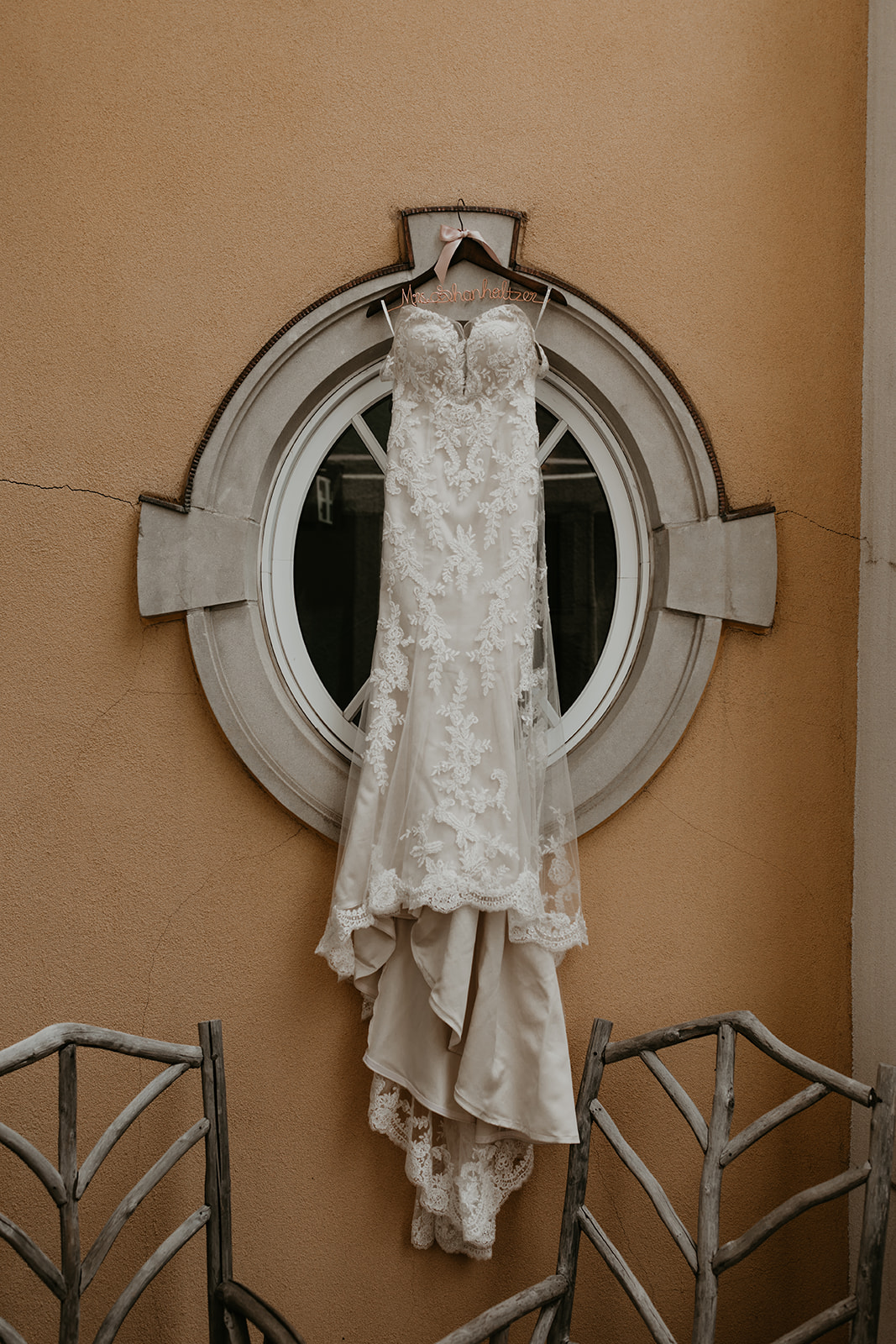 brides dress hangs up before her dreamy Betty Ford Alpine Gardens Wedding