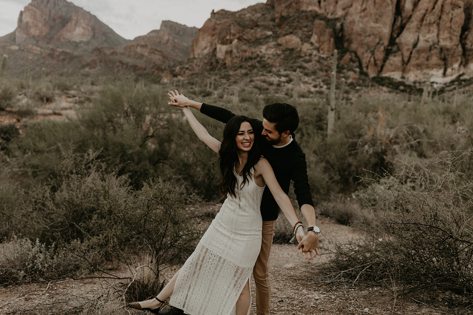 beautiful couple dance together in the Arizona desert 