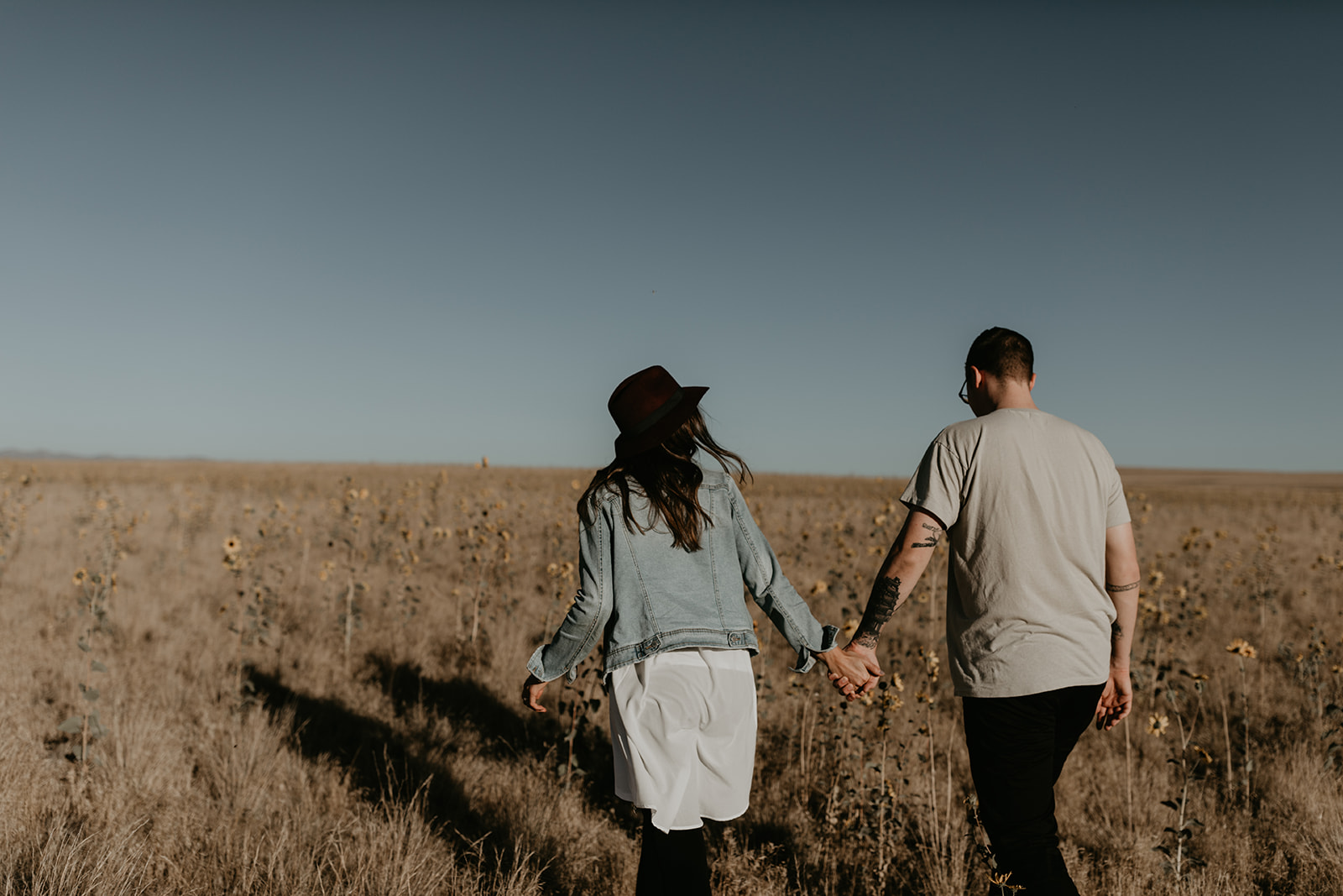 couple pose together in the gorgeous Utah nature during their outdoor engagement photoshoot 