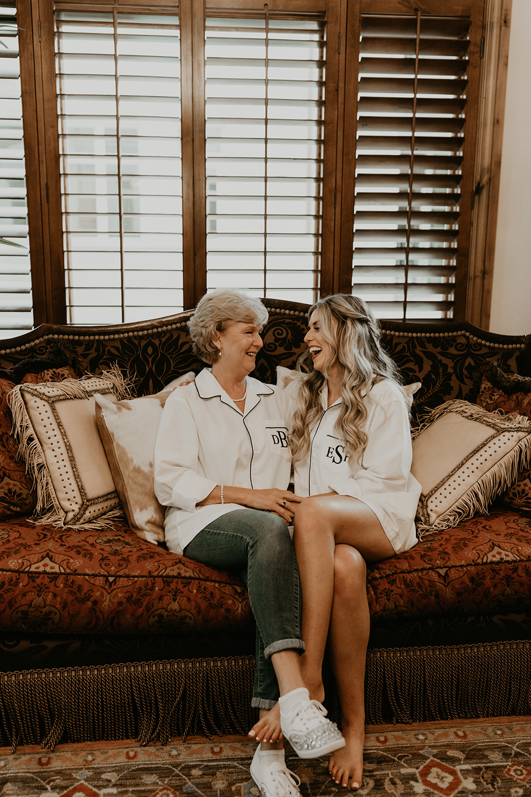 bride shares a laugh with her mom before her stunning Betty Ford Alpine Gardens Wedding day