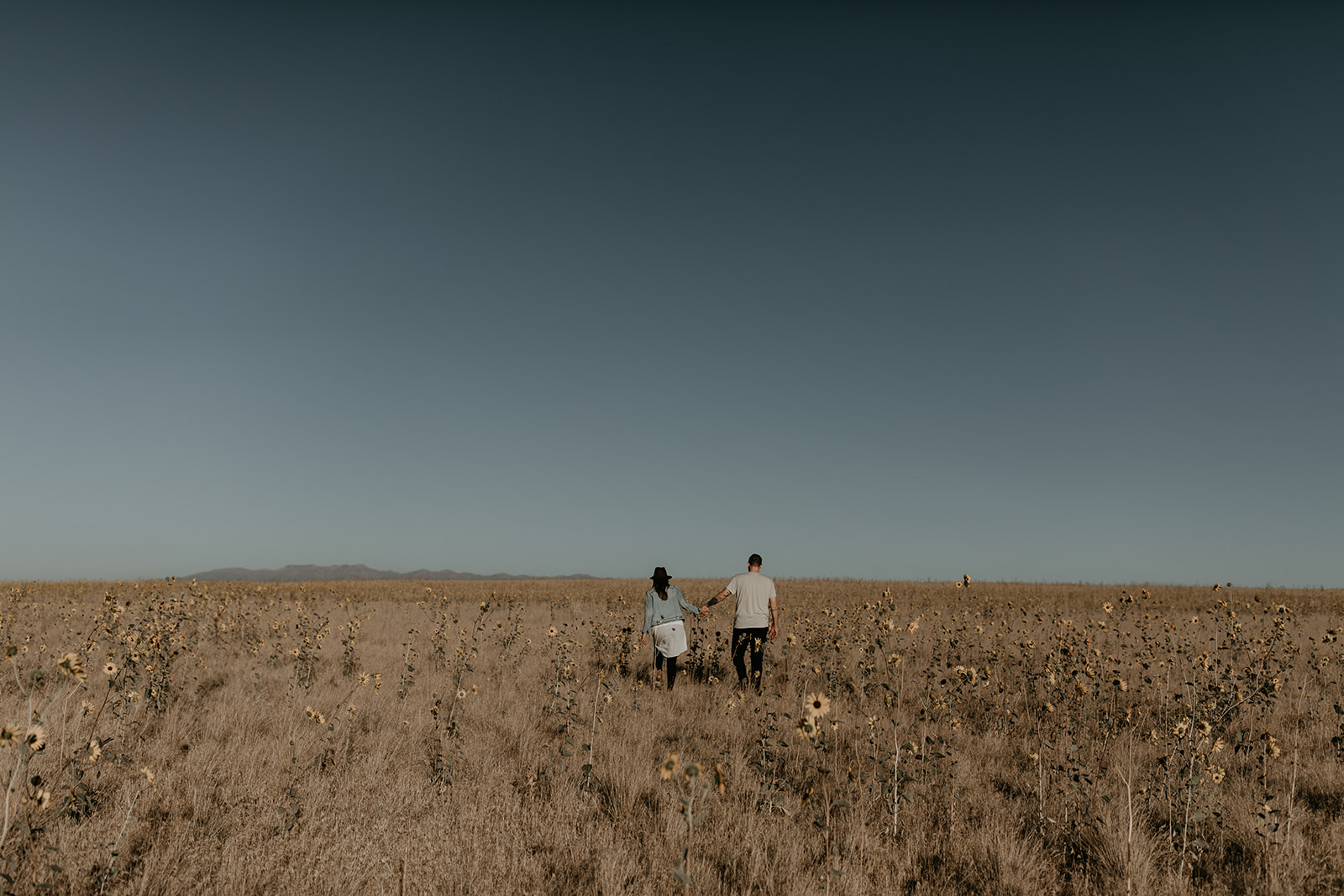 couple pose together in the gorgeous Utah nature during their outdoor engagement photoshoot 