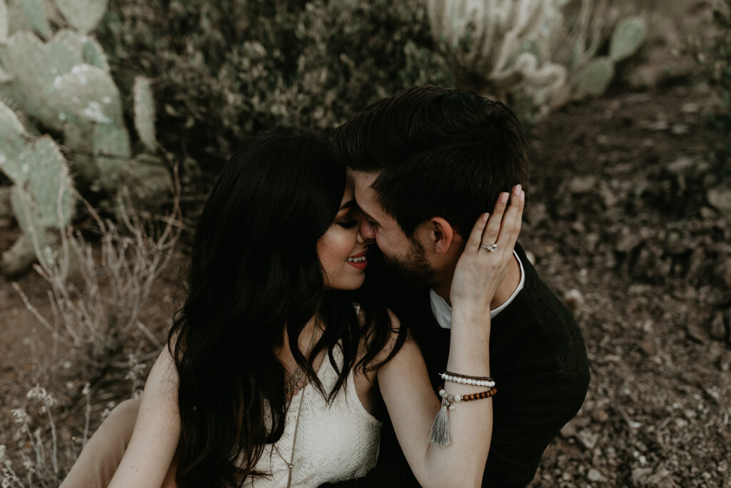 stunning couple pose romantically during their hiking engagement photos