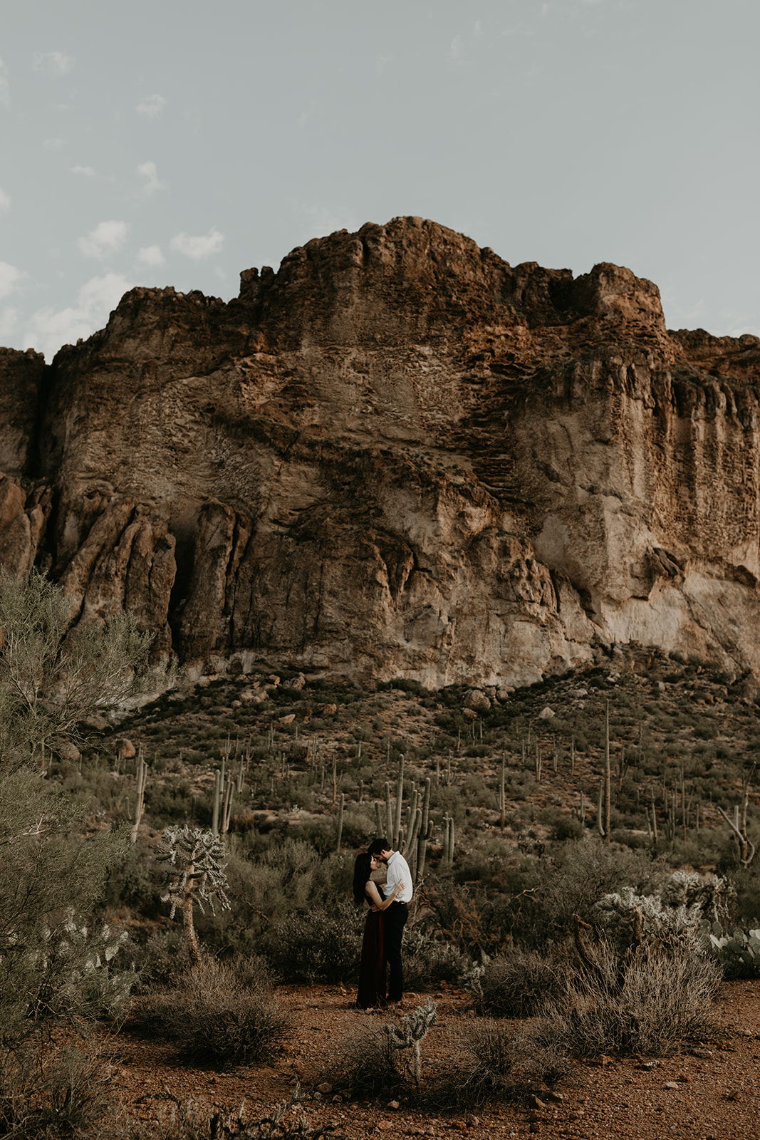 stunning couple pose in the Arizona nature during their hiking engagement photos