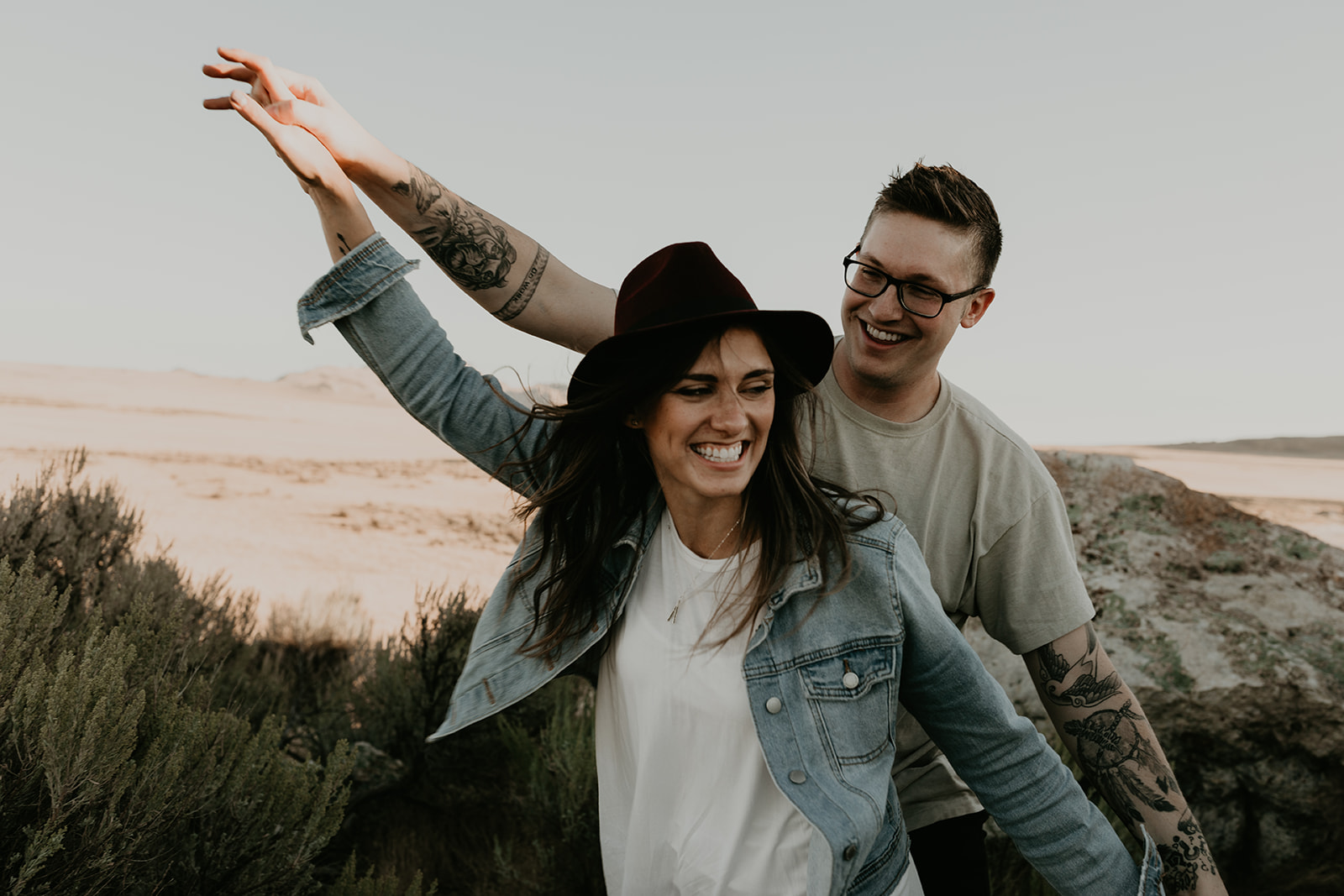 couple pose together in the gorgeous Utah nature during their outdoor engagement photoshoot 