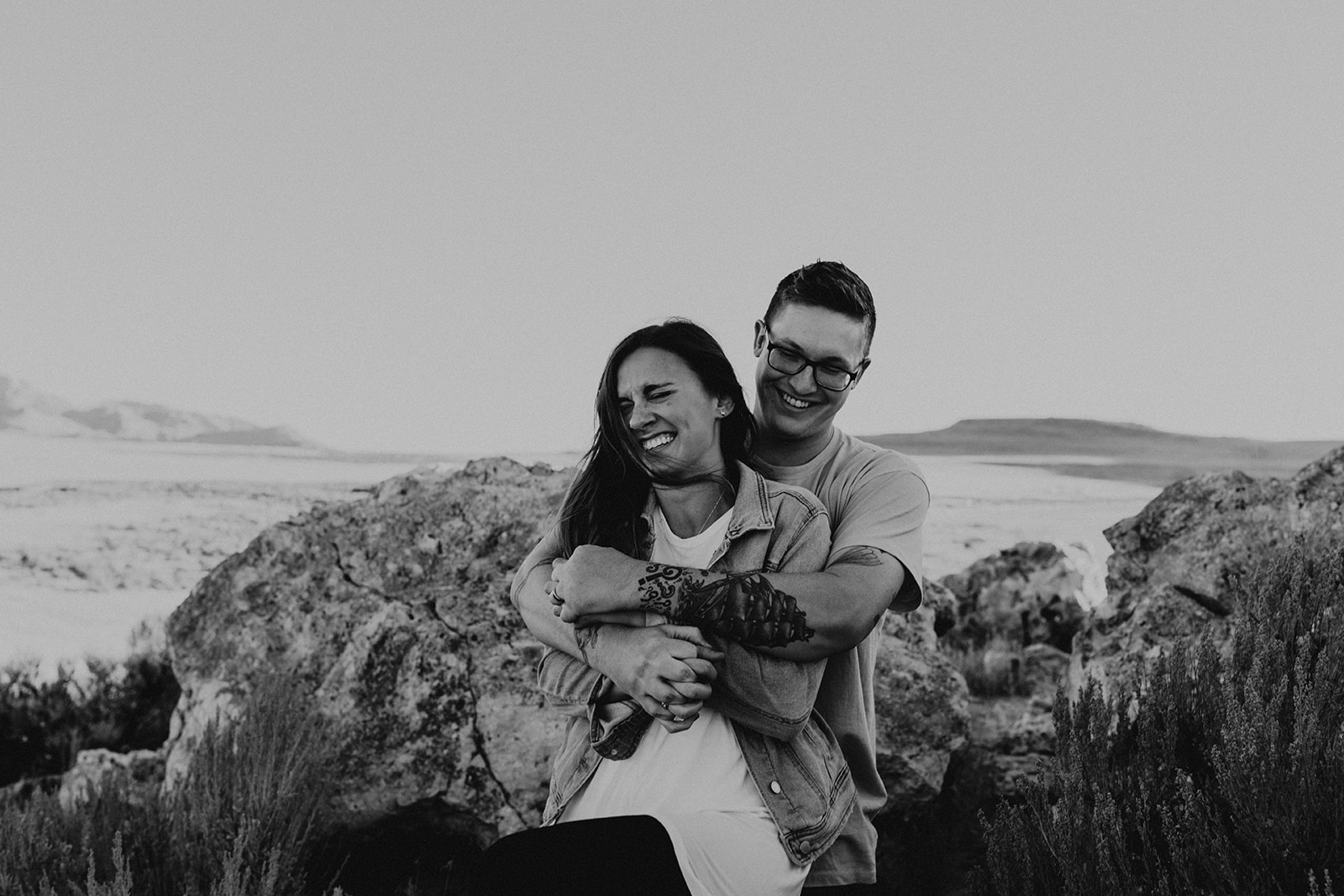 couple pose together in the gorgeous Utah nature during their outdoor engagement photoshoot 