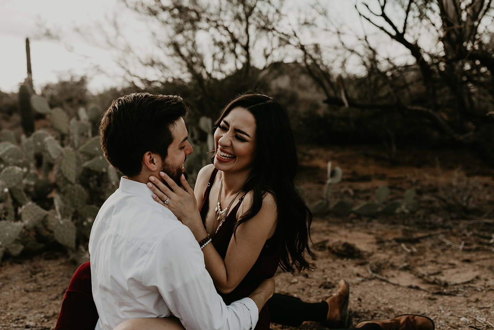 stunning couple pose in the Arizona nature during their hiking engagement photos