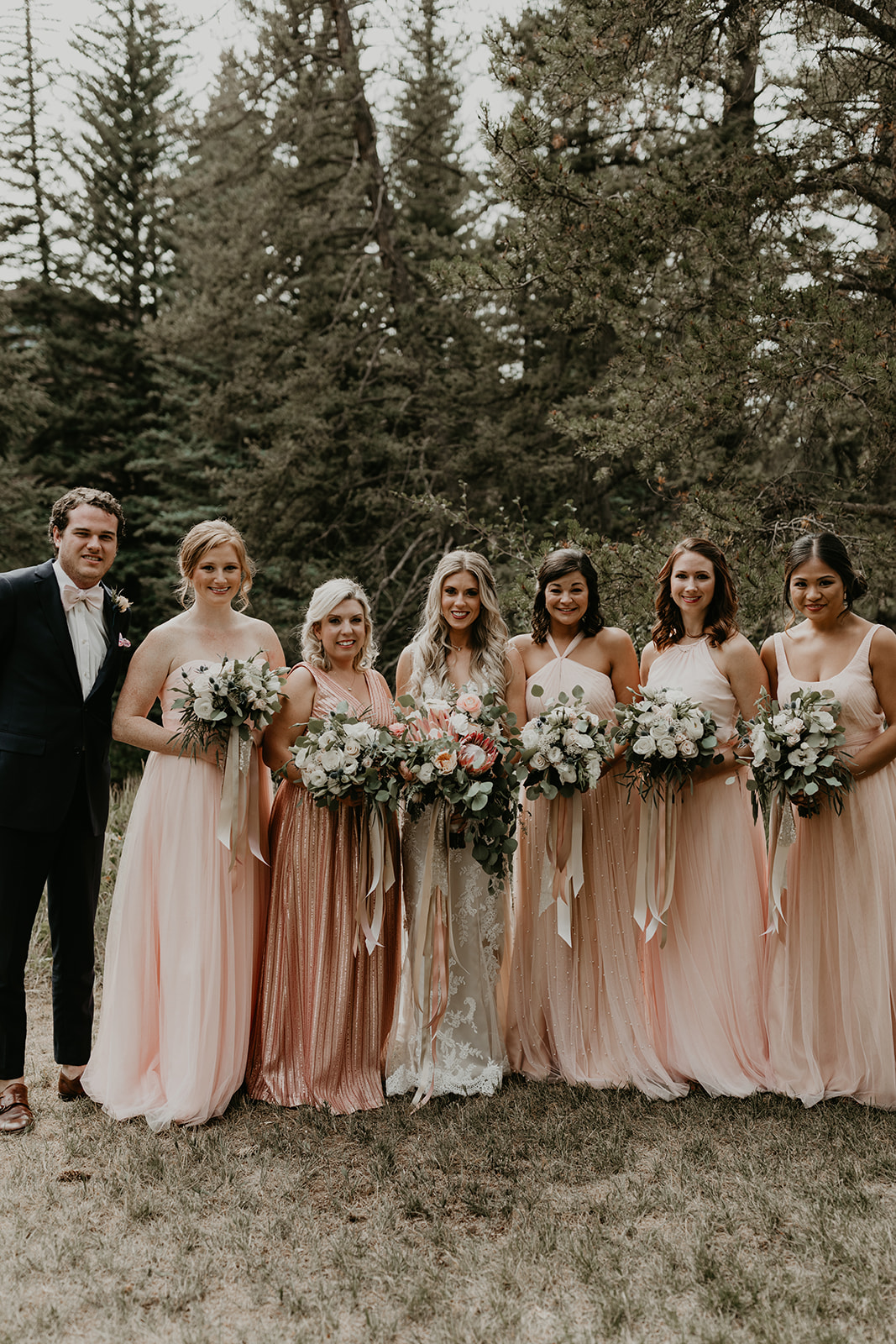 bridesmaids pose together after the elegant Betty Ford Alpine Gardens Wedding 