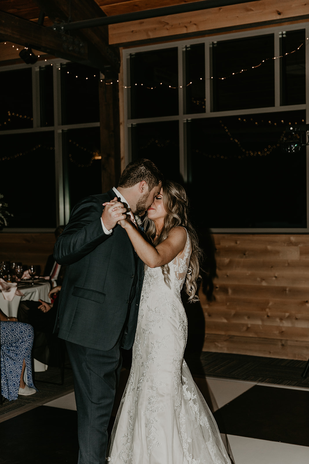 candid photos of the bride and groom sharing their first dance together 