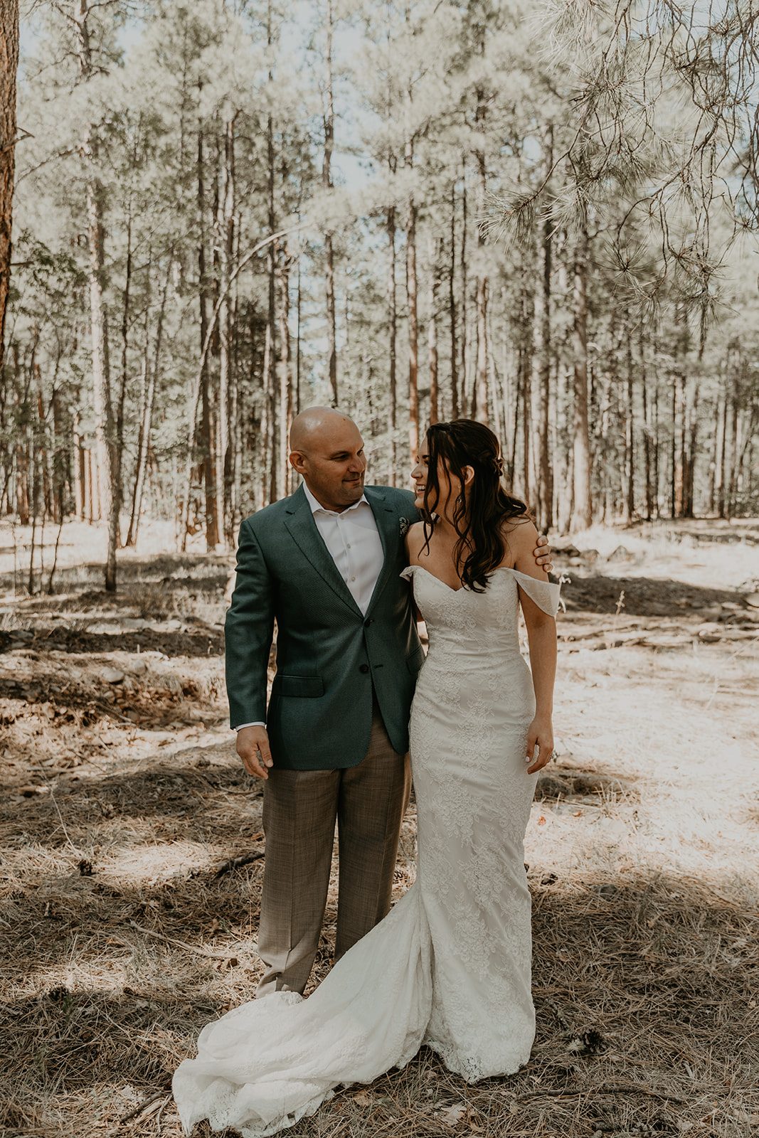 bride shares a first look ceremony with her father ahead of her Mormon lake lodge wedding 