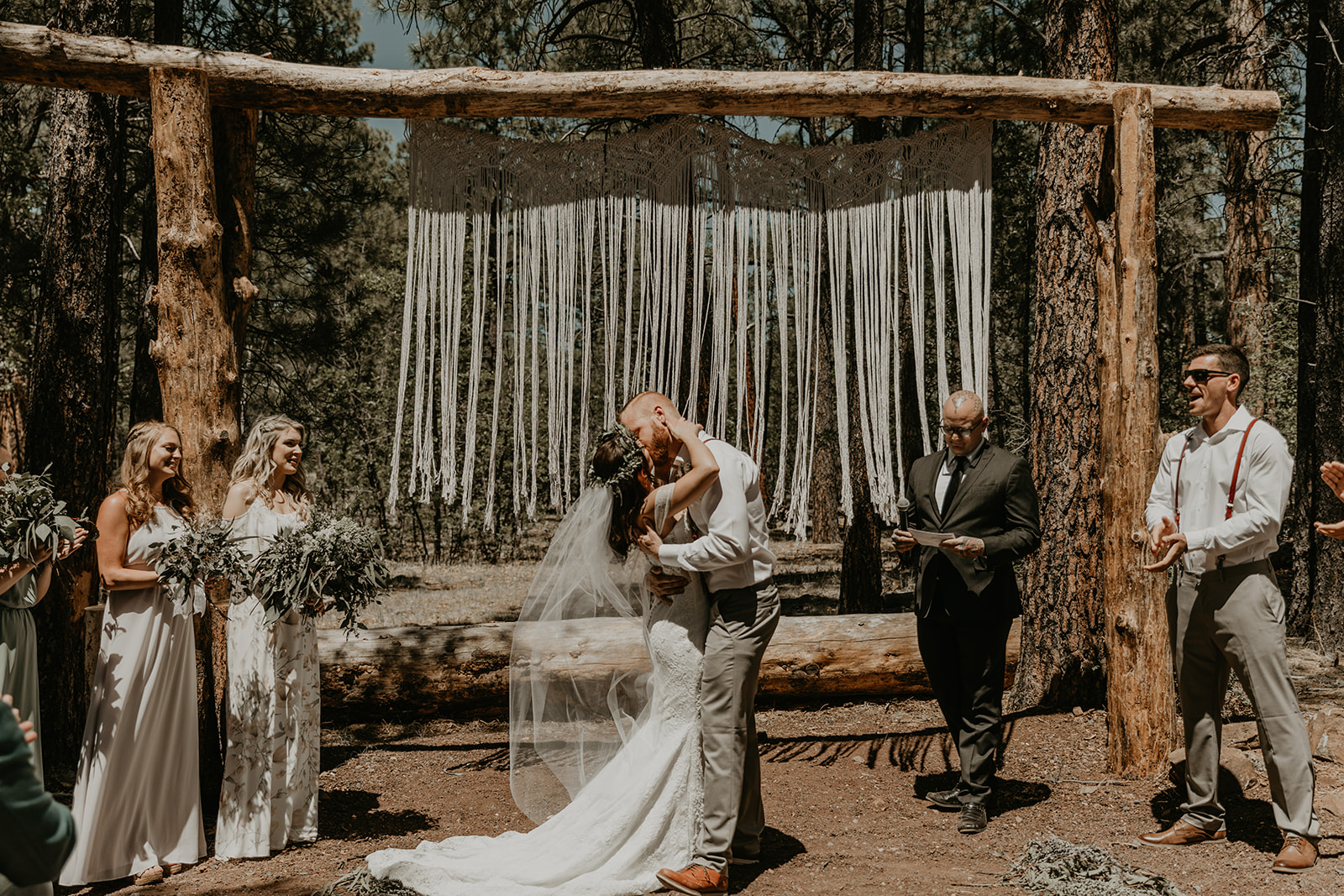 bride and groom share a kiss as they wrap up their Arizona wedding photoshoot