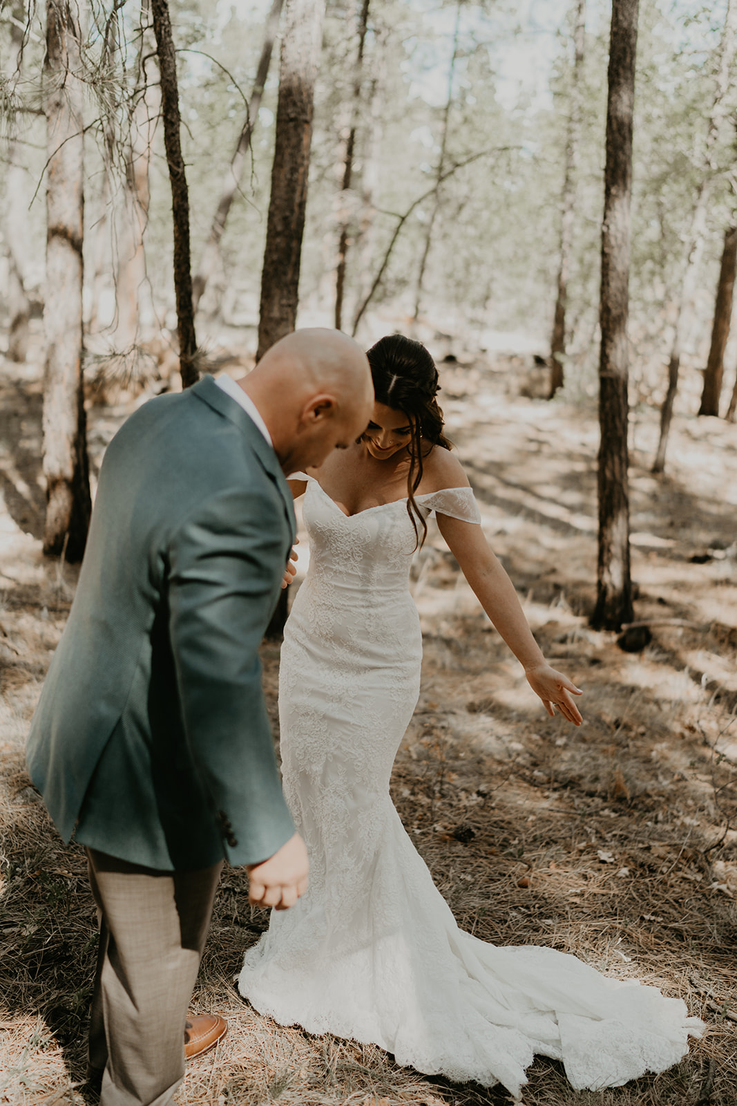 bride shares a first look ceremony with her father ahead of her Mormon lake lodge wedding 