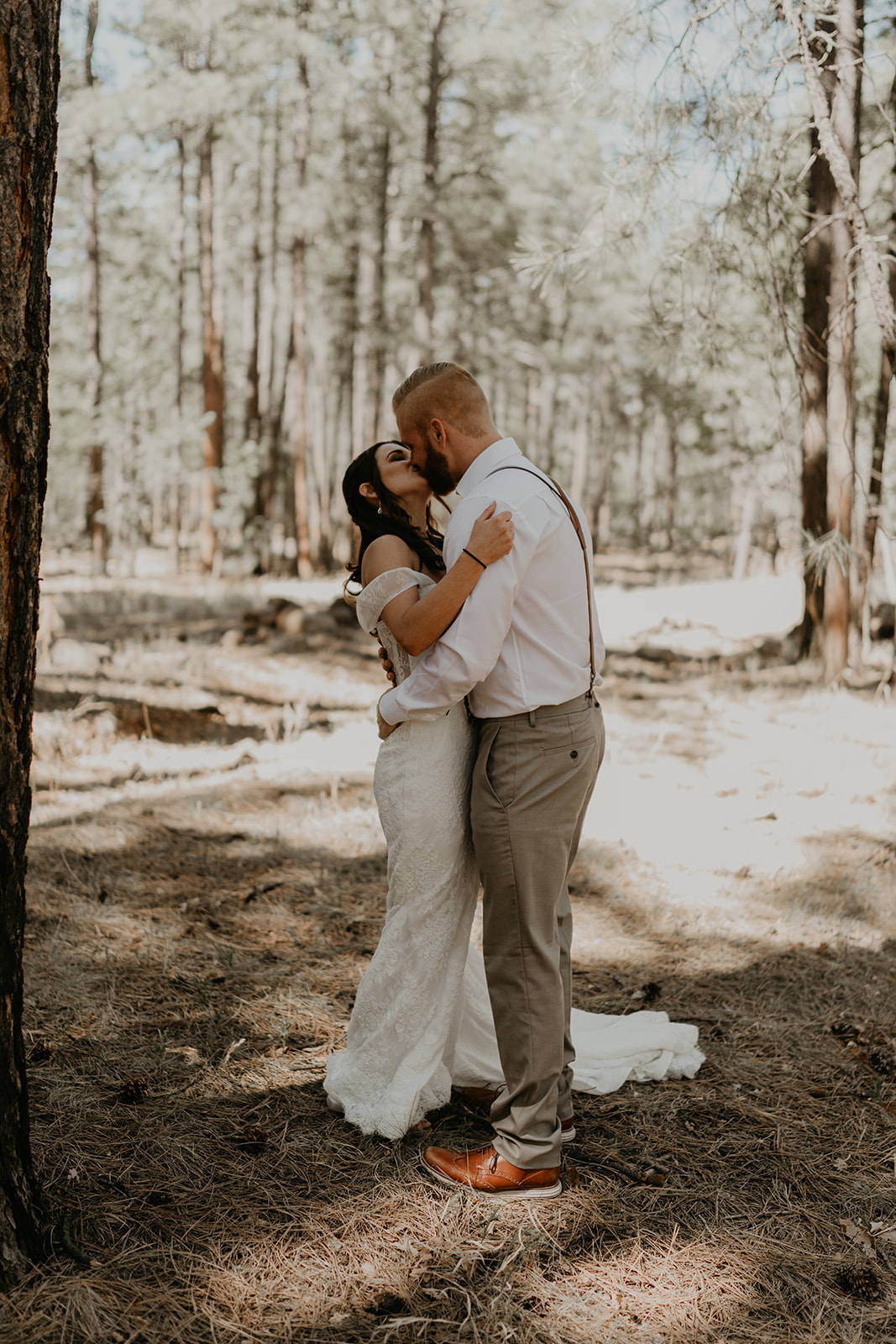 bride and groom share an intimate moment during their Arizona first look wedding photoshoot