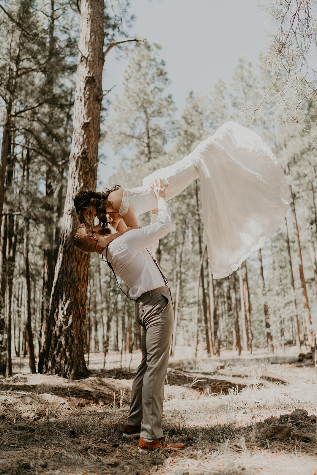 bride and groom share an intimate moment during their Arizona first look wedding photoshoot