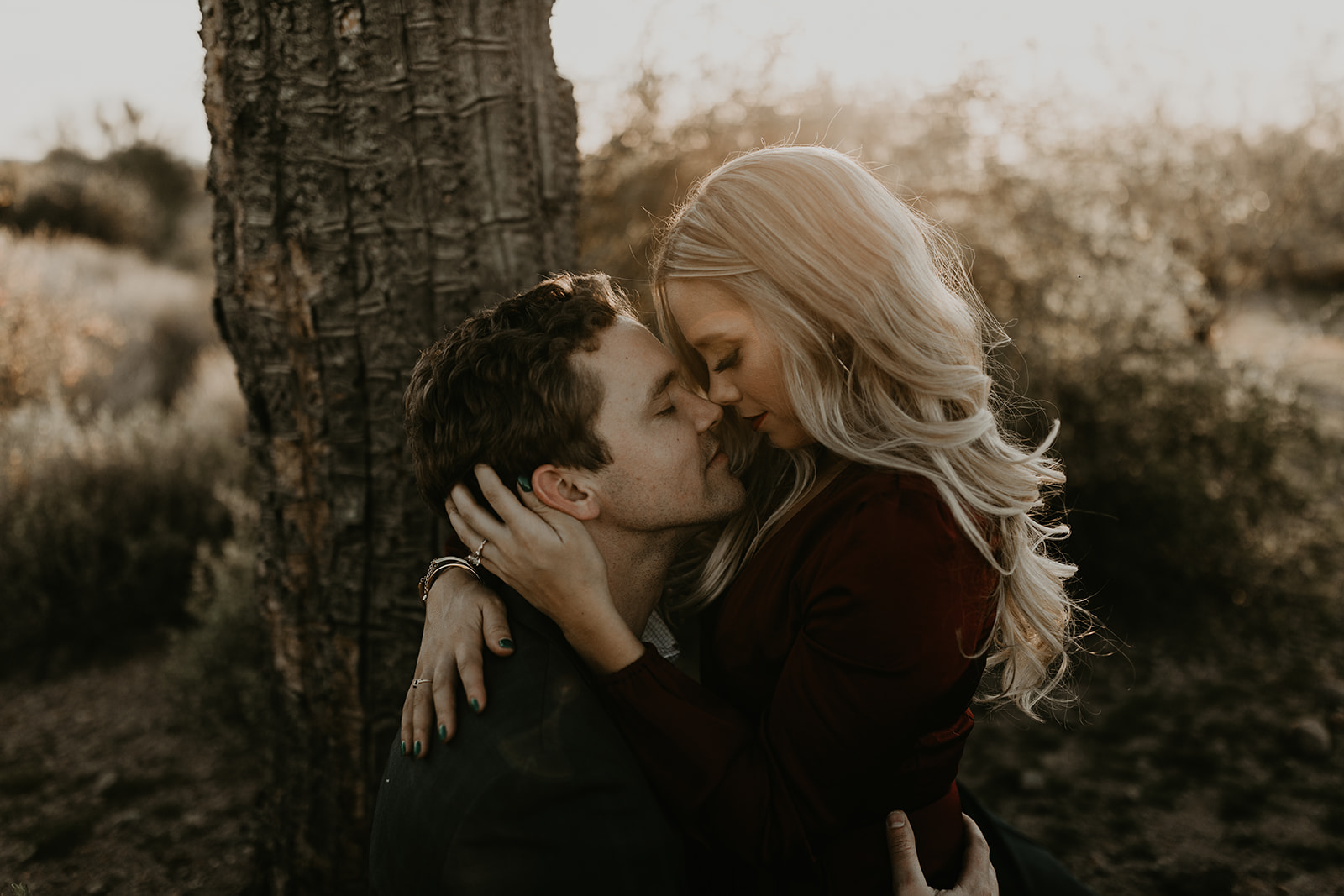 stunning couple pose together in the Arizona desert