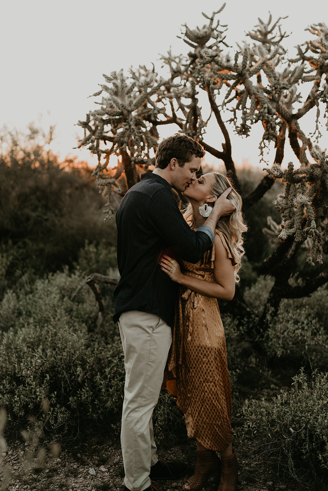 stunning couple pose together in the Arizona desert