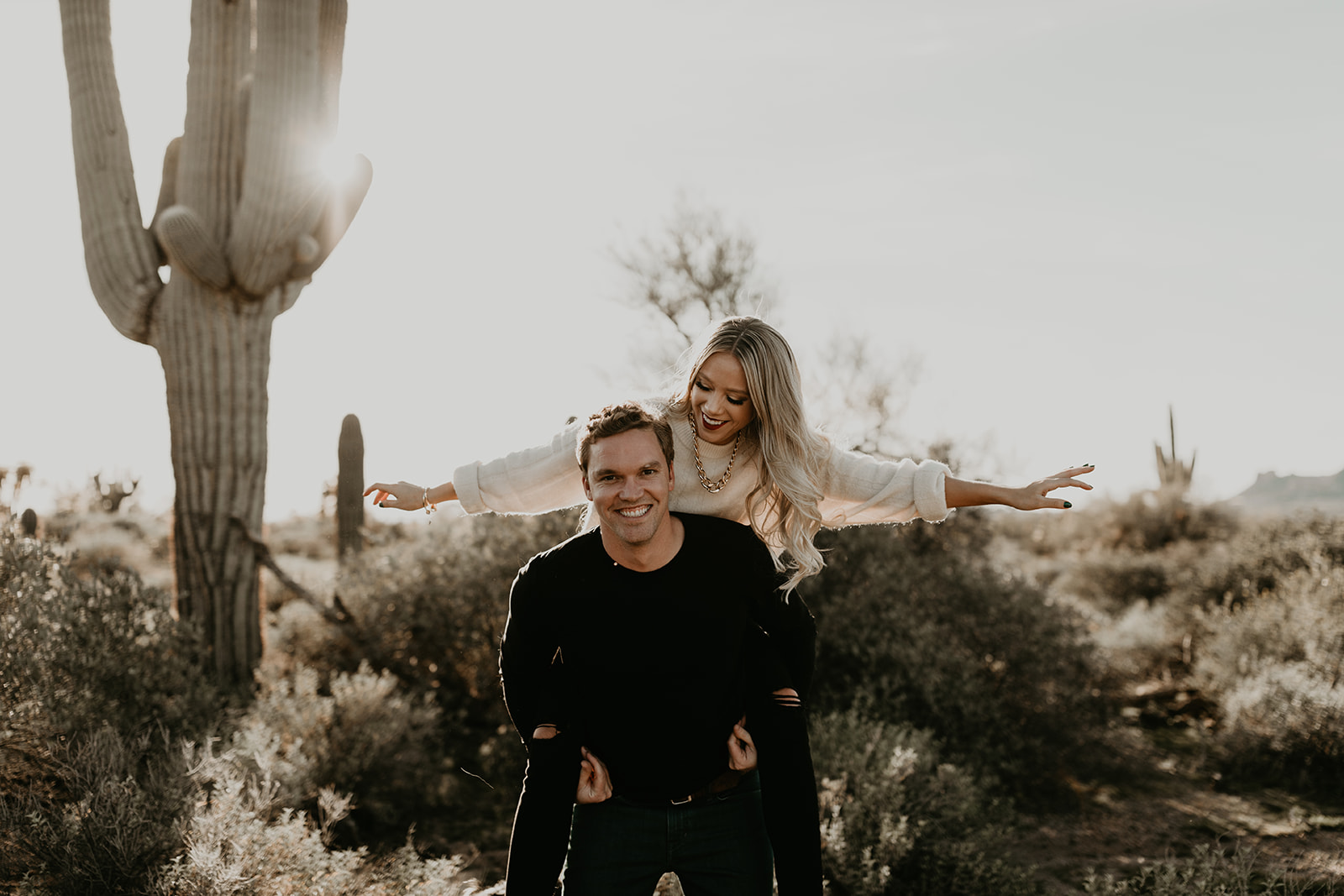 beautiful couple pose together during their lost dutchman state park