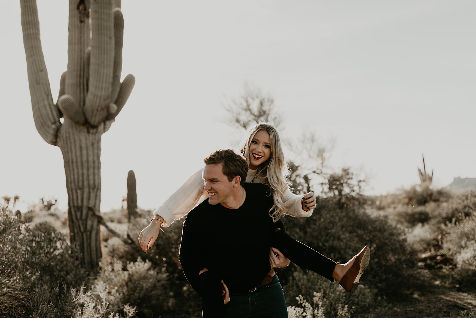 beautiful couple pose together during their lost dutchman state park