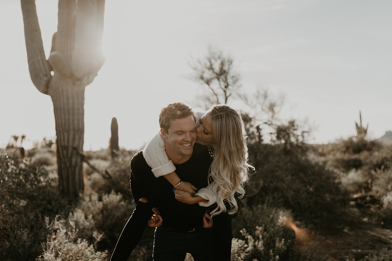 beautiful couple pose together during their lost dutchman state park