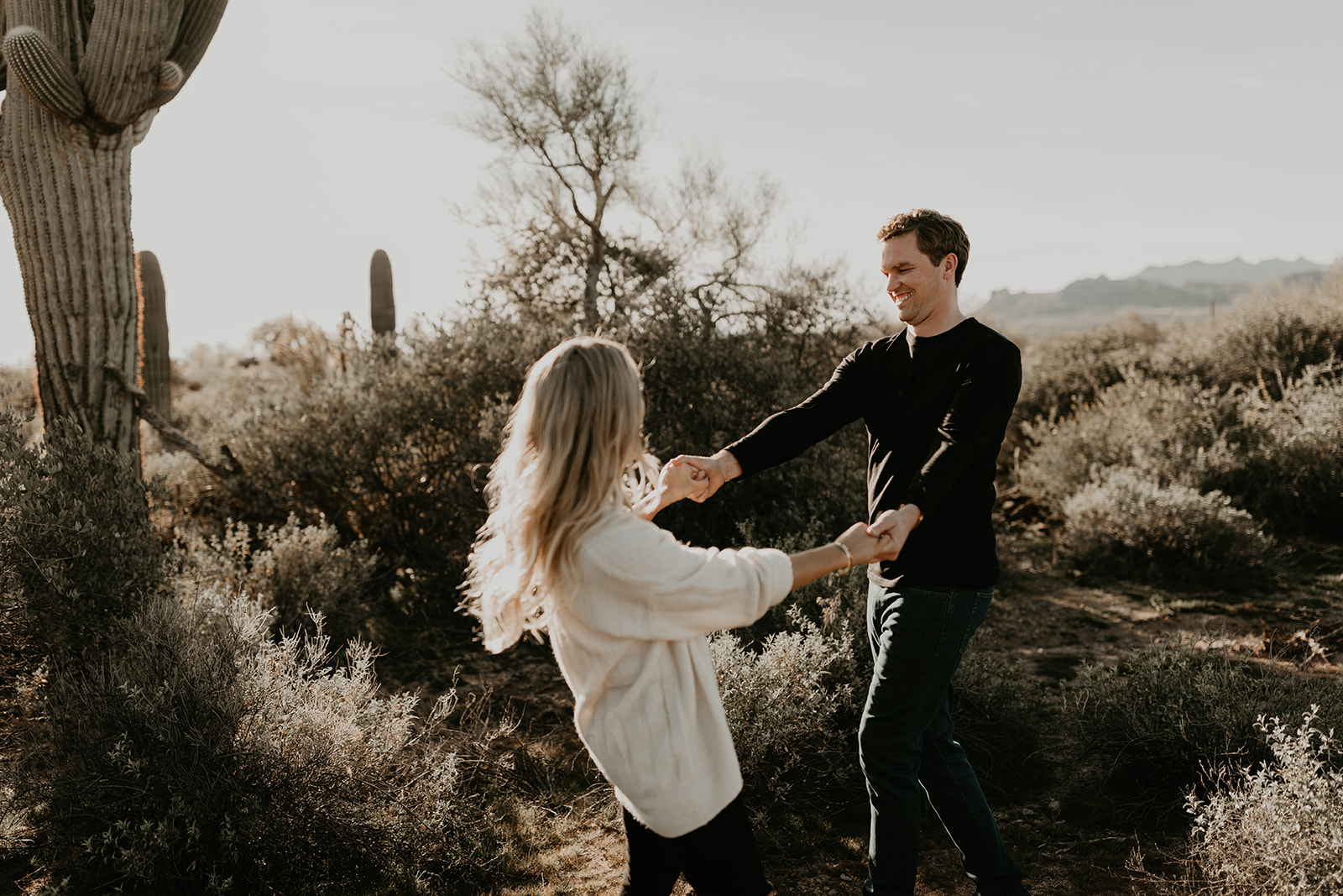 beautiful couple dance together during their lost dutchman state park