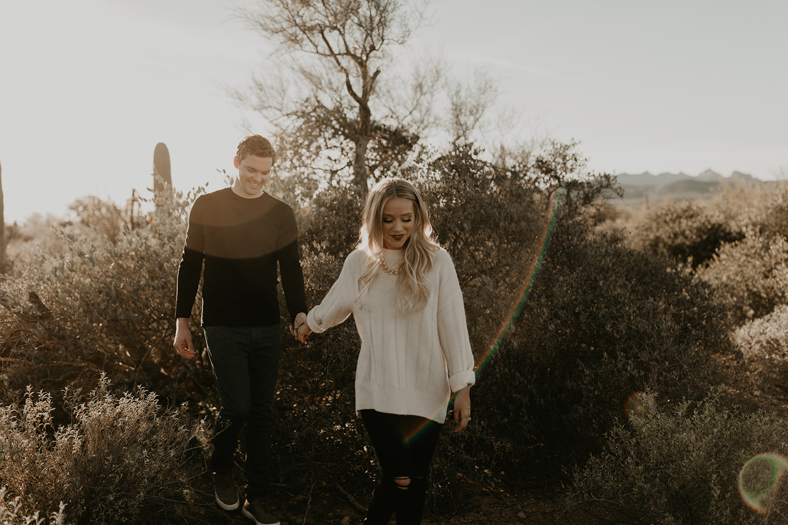 stunning couple pose together in the Arizona desert