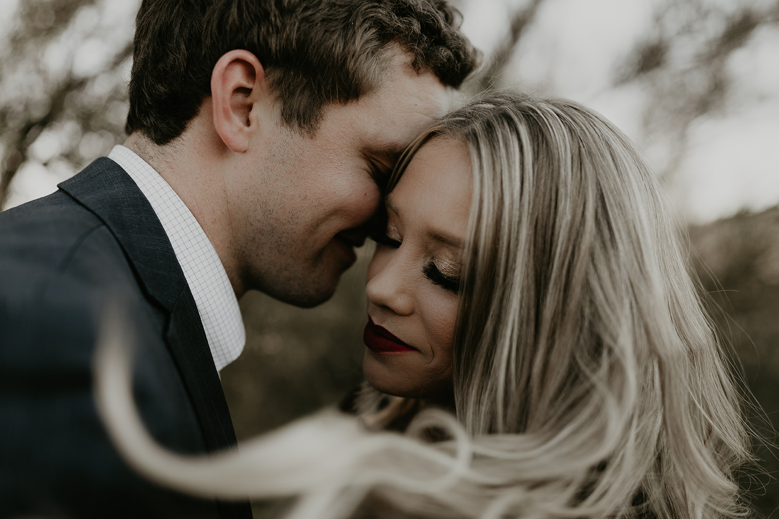 beautiful couple pose together during their lost dutchman state park