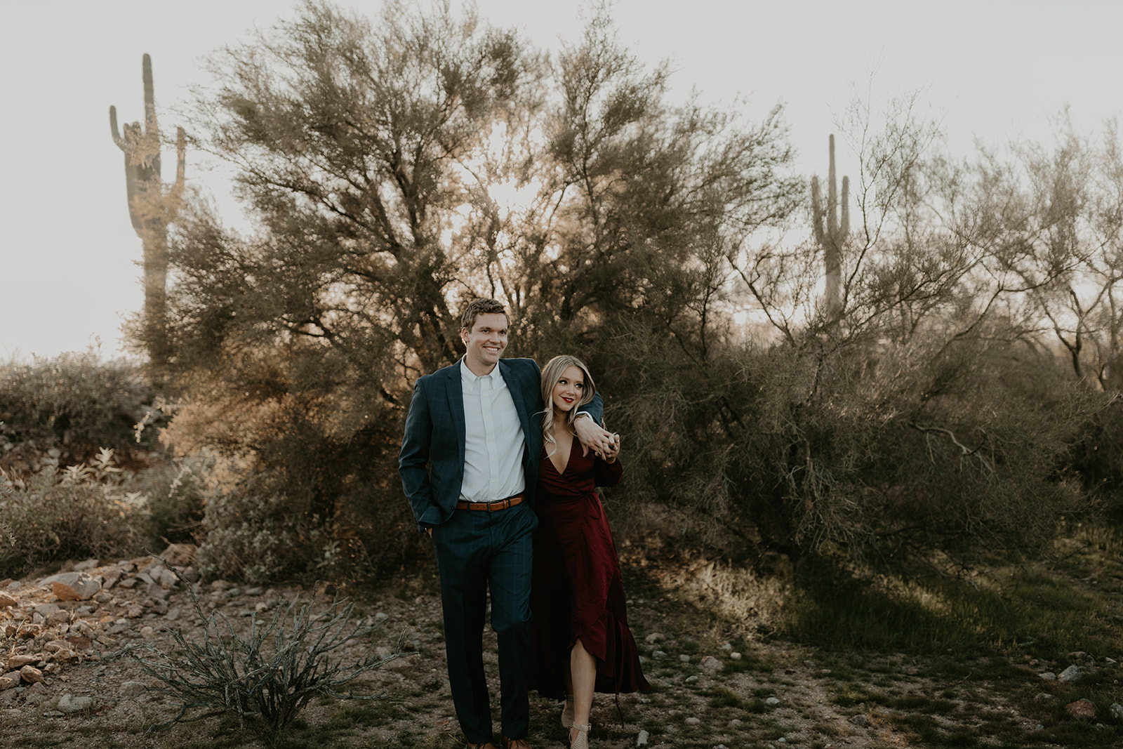 stunning couple pose together in the Arizona desert