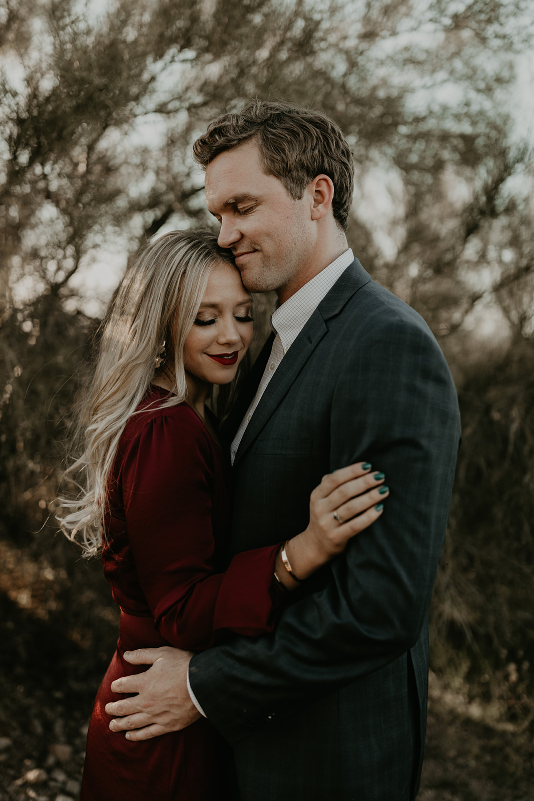 stunning couple pose together in the Arizona desert