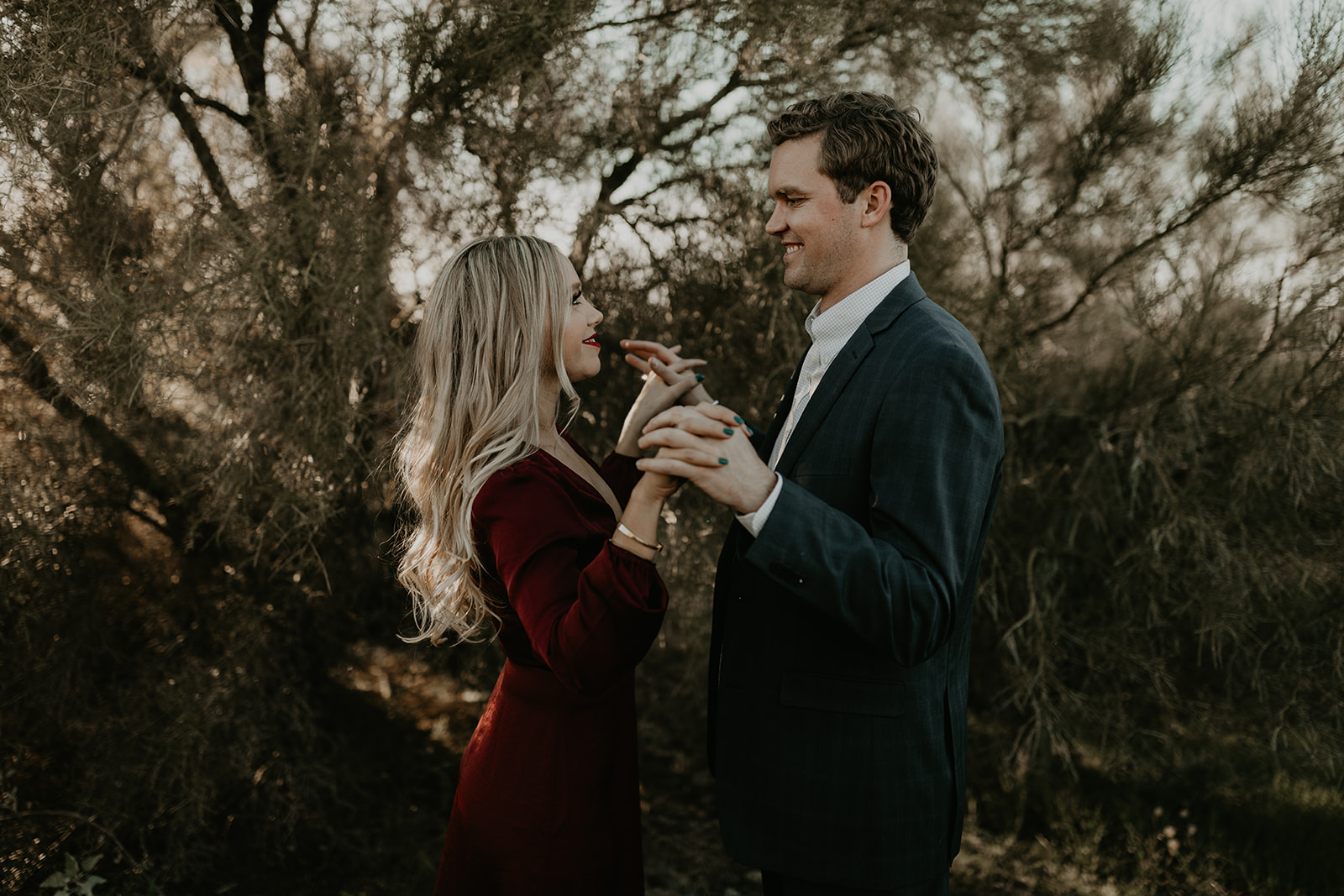 stunning couple pose together in the Arizona desert