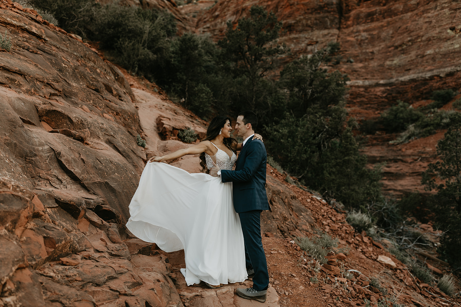 stunning couple pose with the Arizona rocks in the background