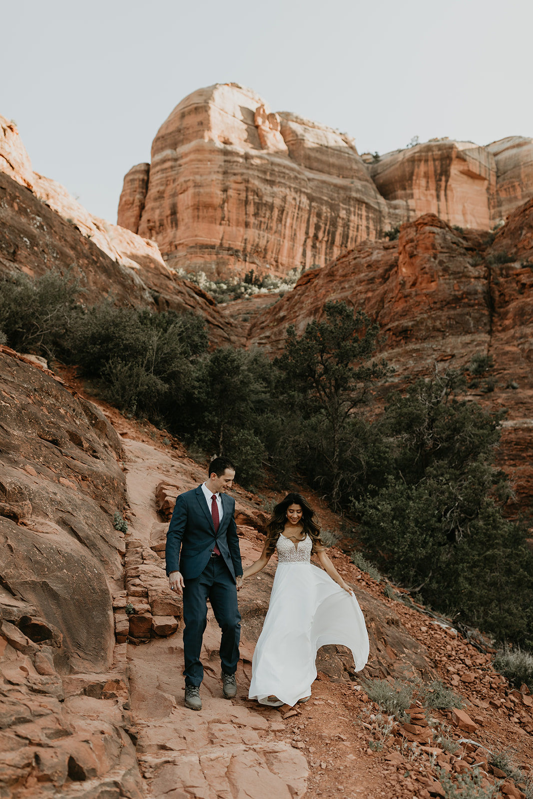 stunning couple pose with the Arizona rocks in the background