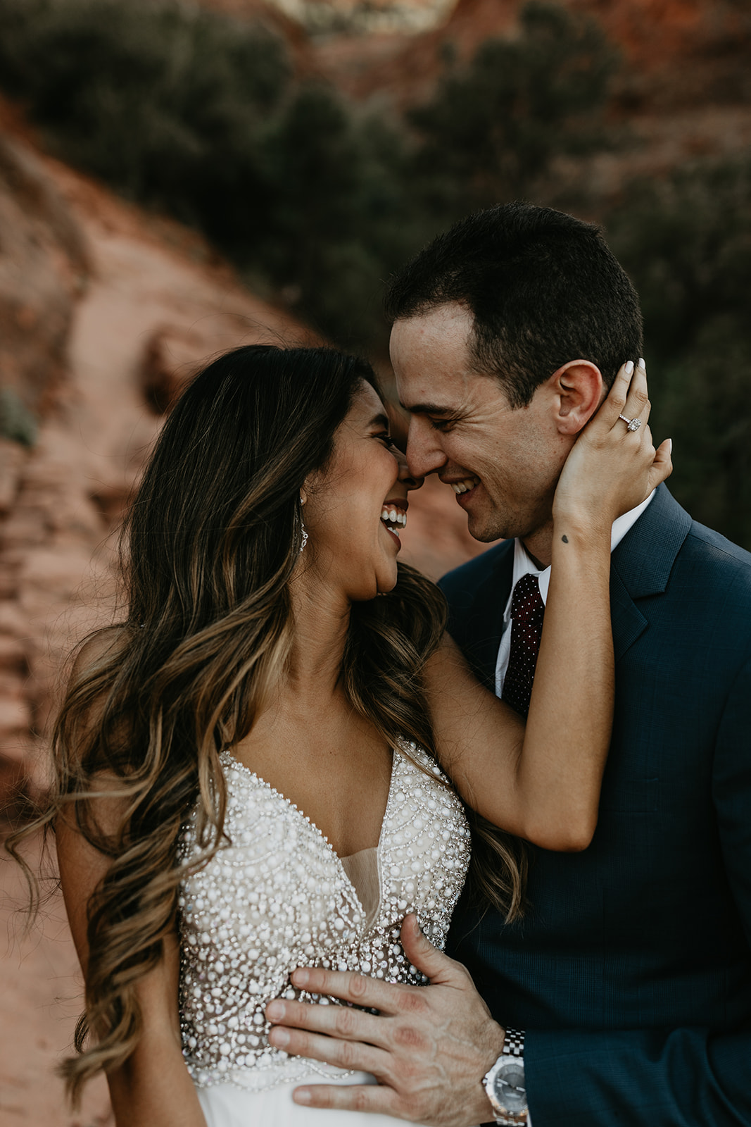 stunning couple pose together for their Sedona cathedral adventure engagement photos