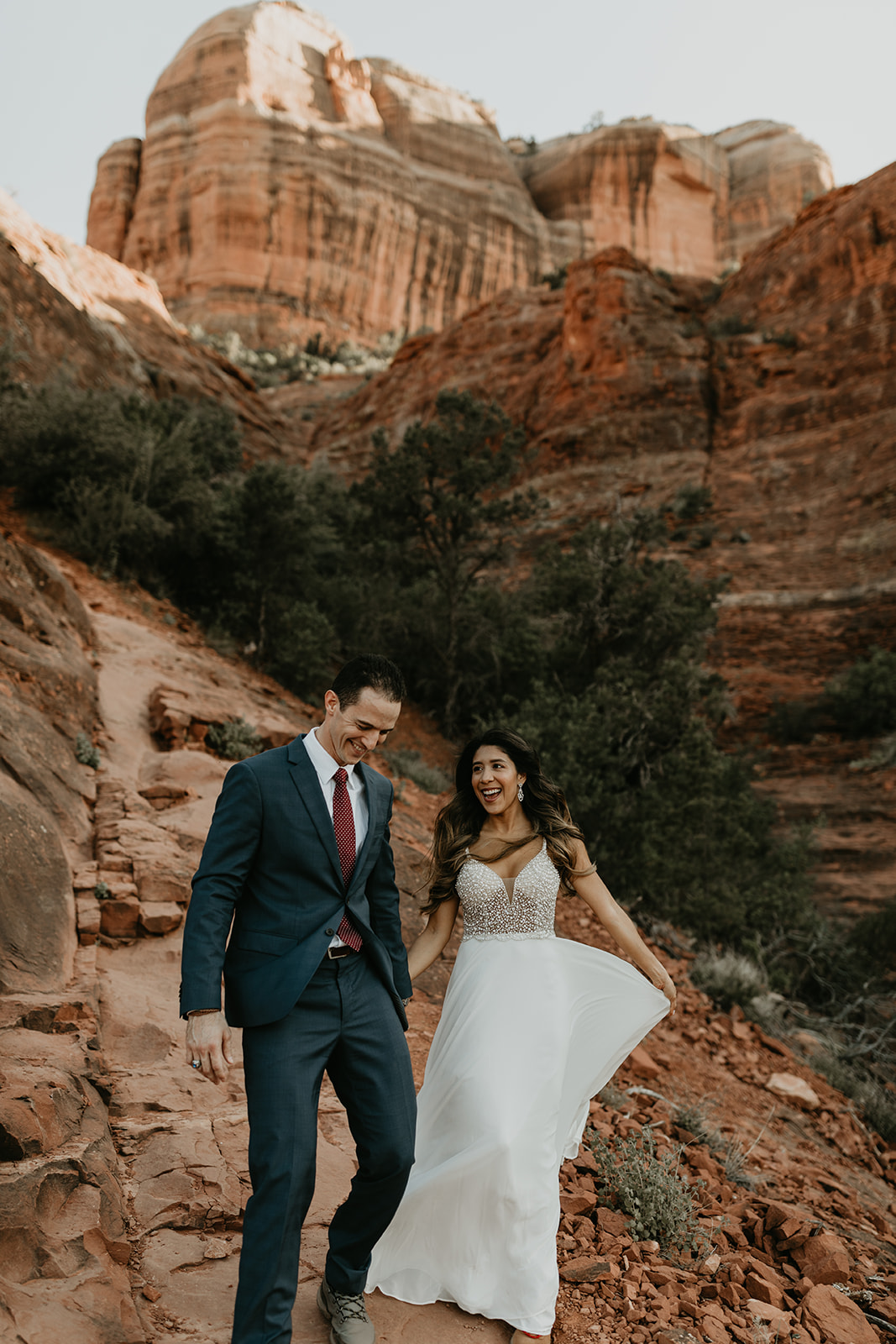 stunning couple pose with the Arizona rocks in the background