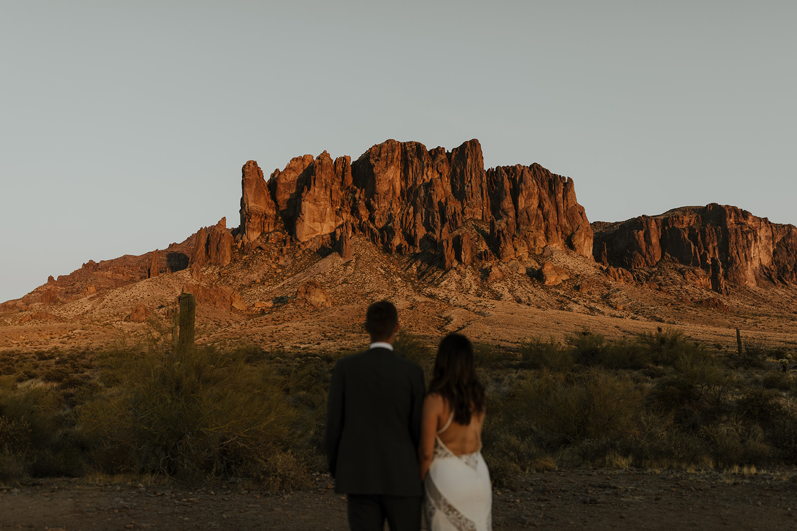 stunning bride and groom pose for a photo after their Apache Junction wedding ceremony