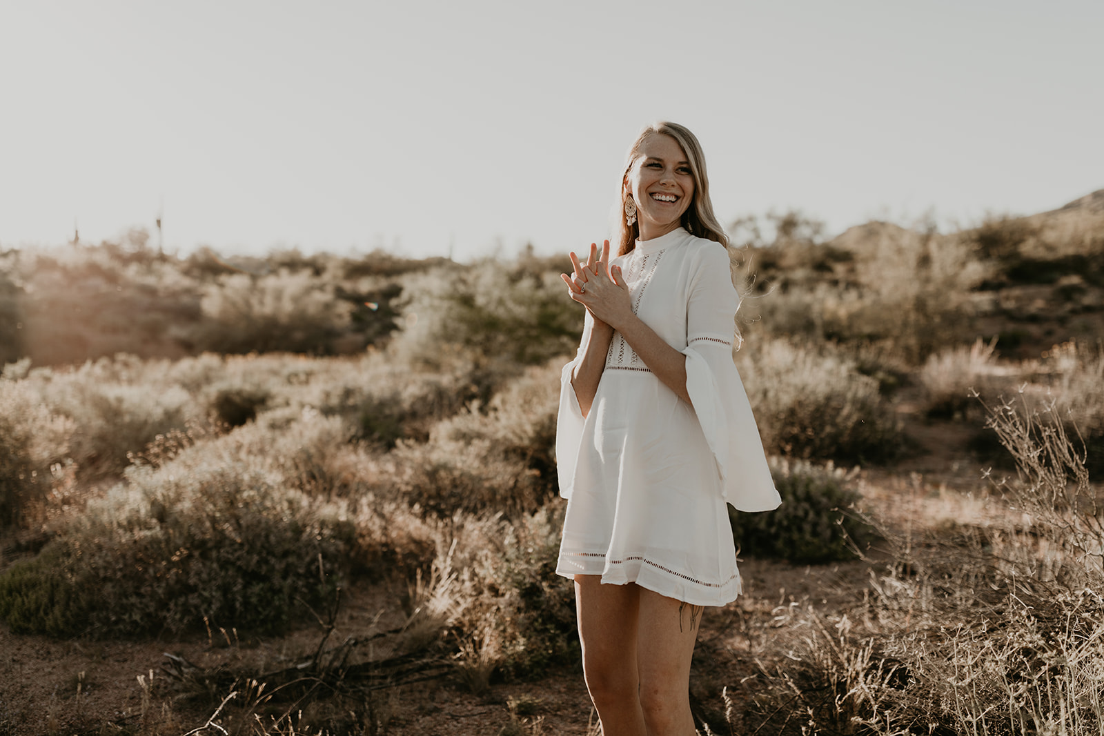 beautiful couple pose together in the Arizona desert