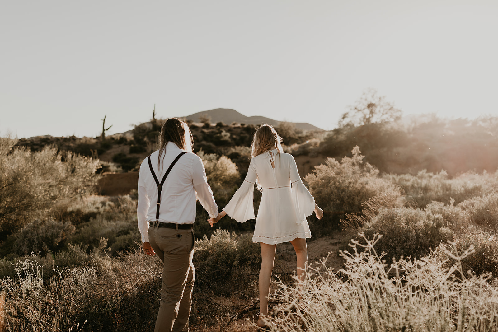 beautiful couple pose together in the Arizona desert