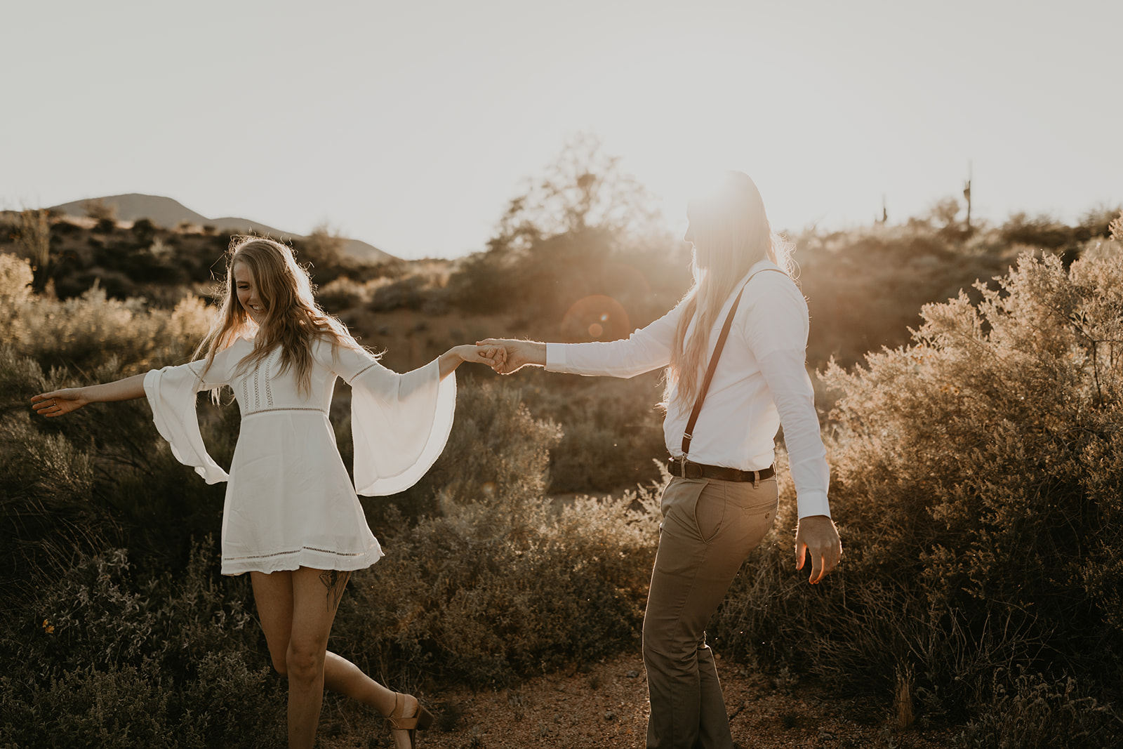 beautiful couple pose together in the Arizona desert