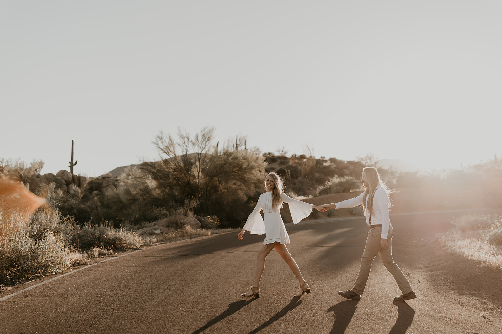 couple walk across the road to get their engagement photoshoot started!