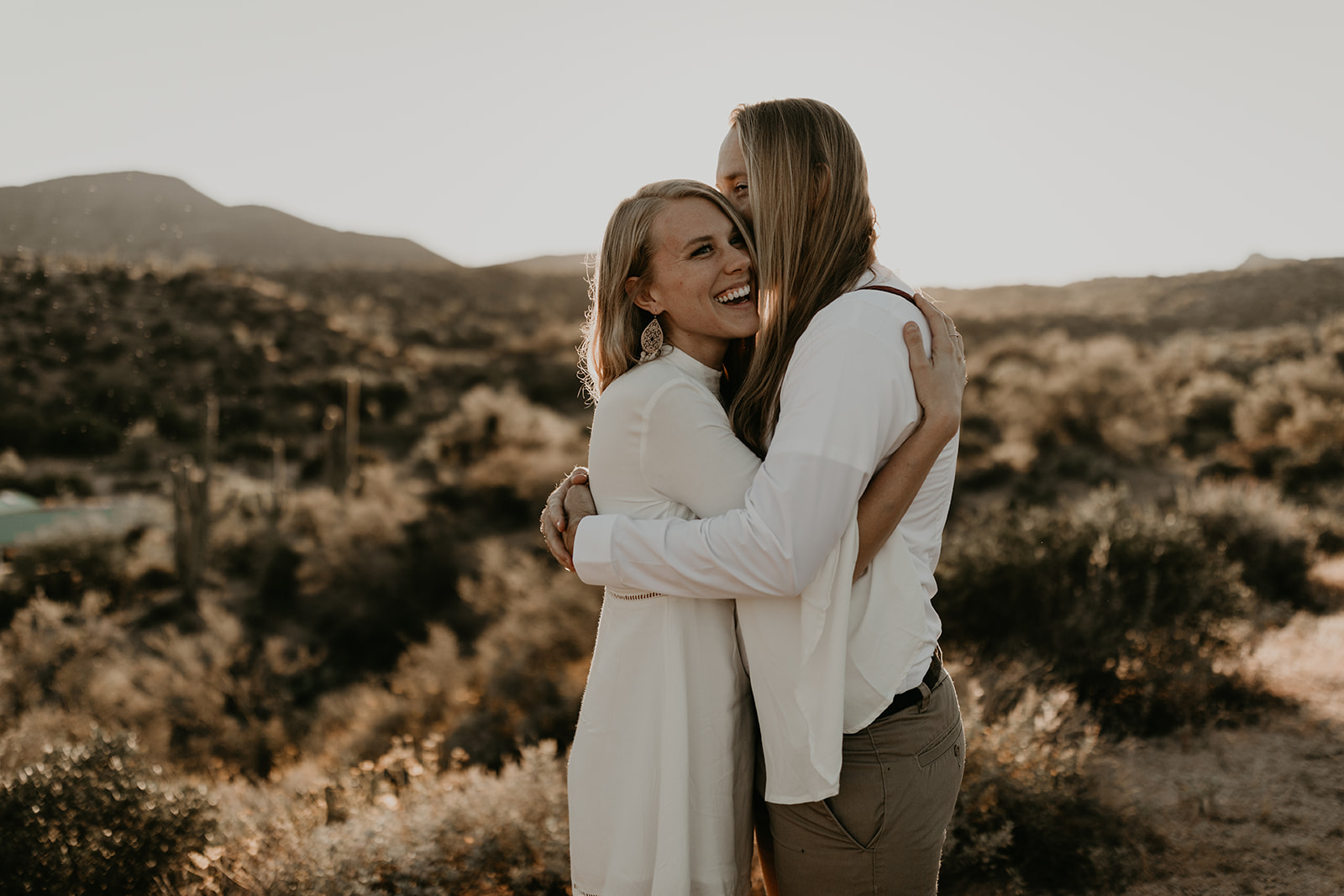 beautiful couple pose together in the Arizona desert