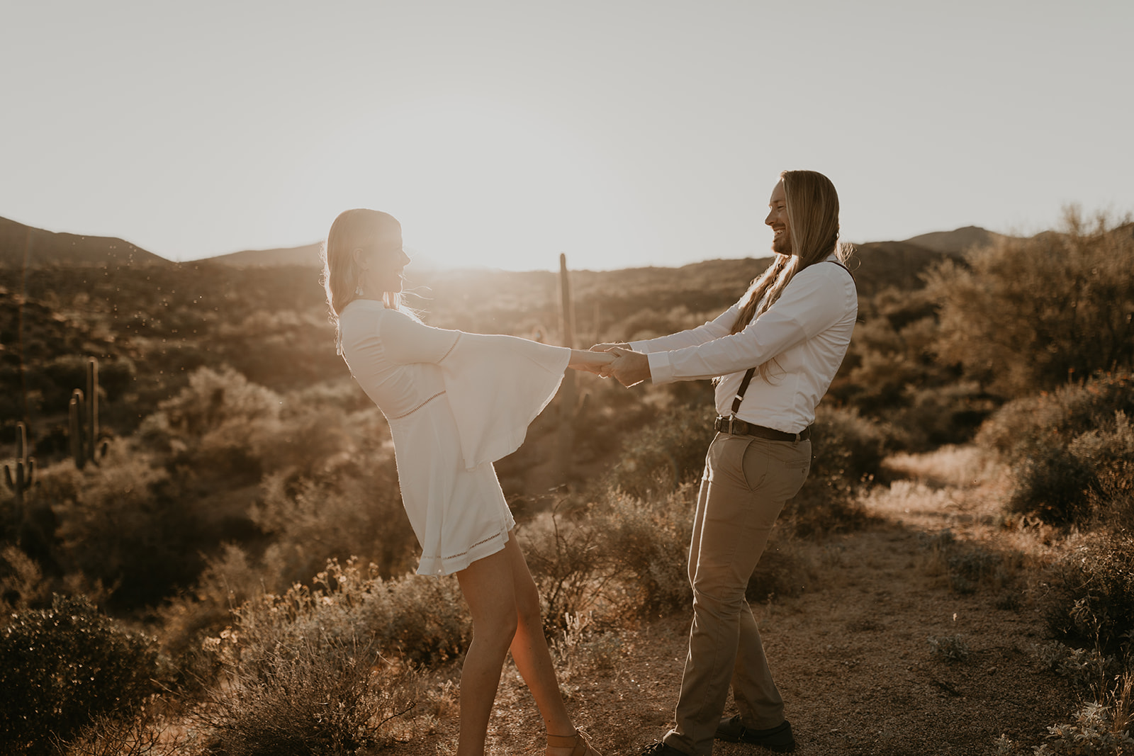 beautiful couple pose together in the Arizona desert