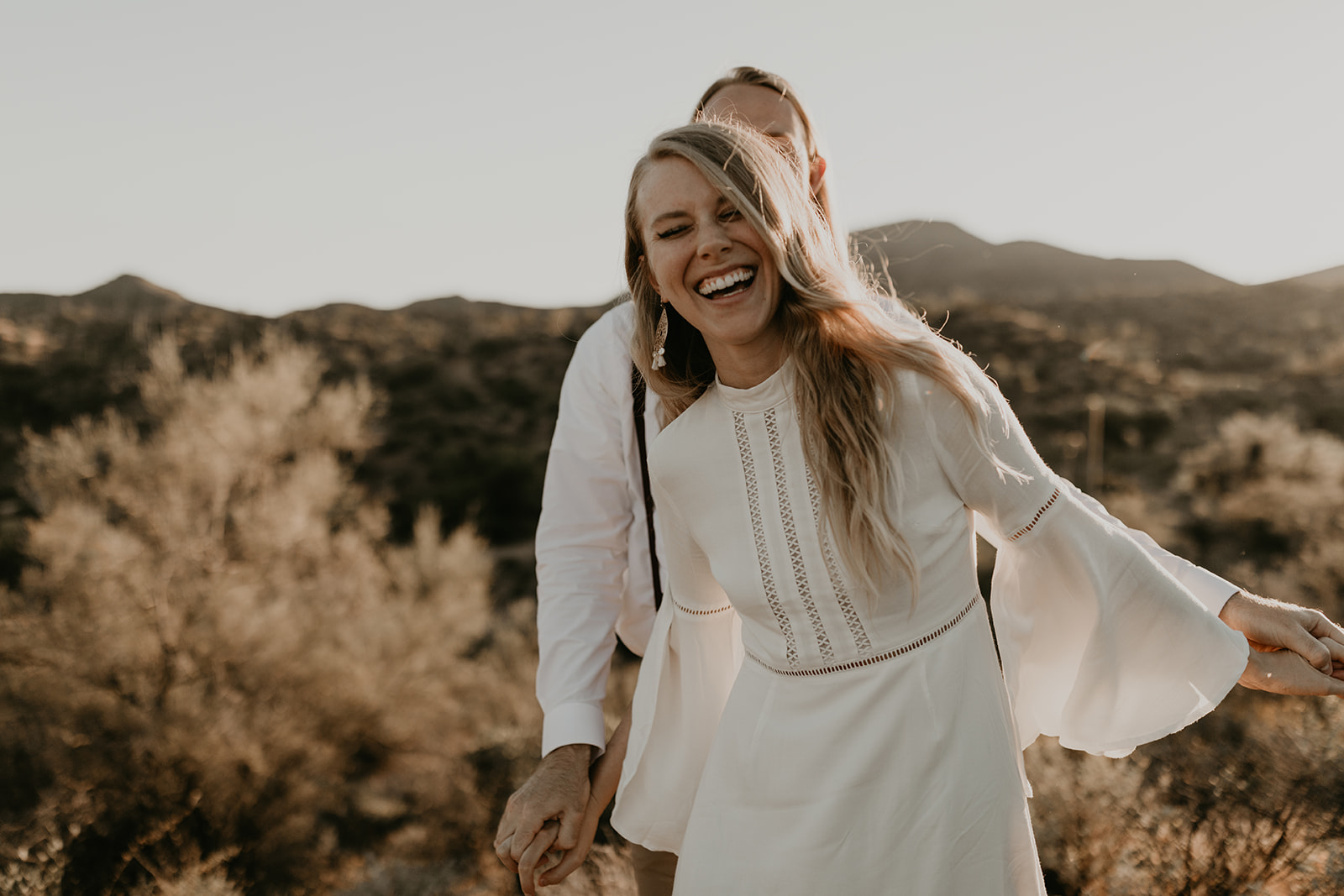 beautiful couple pose together in the Arizona desert