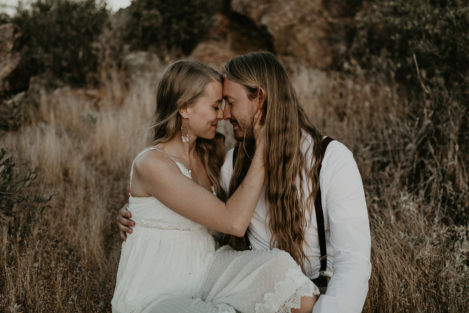 beautiful couple pose together in the Arizona desert