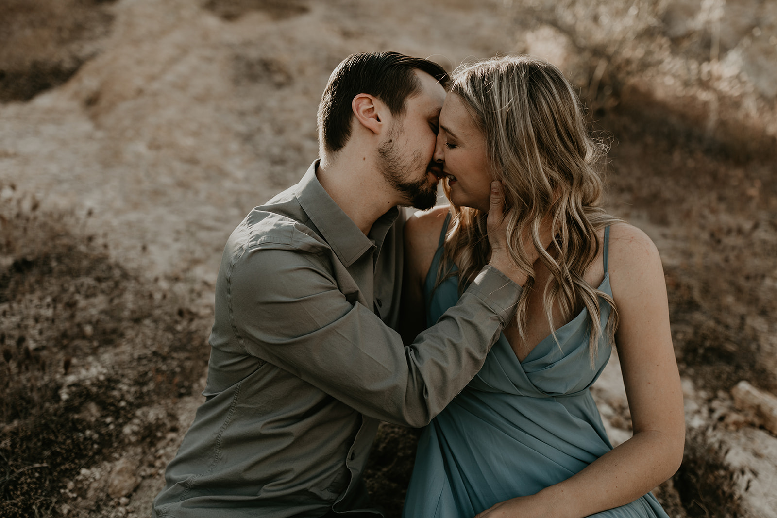 beautiful couple share an intimate moment in the Arizona nature